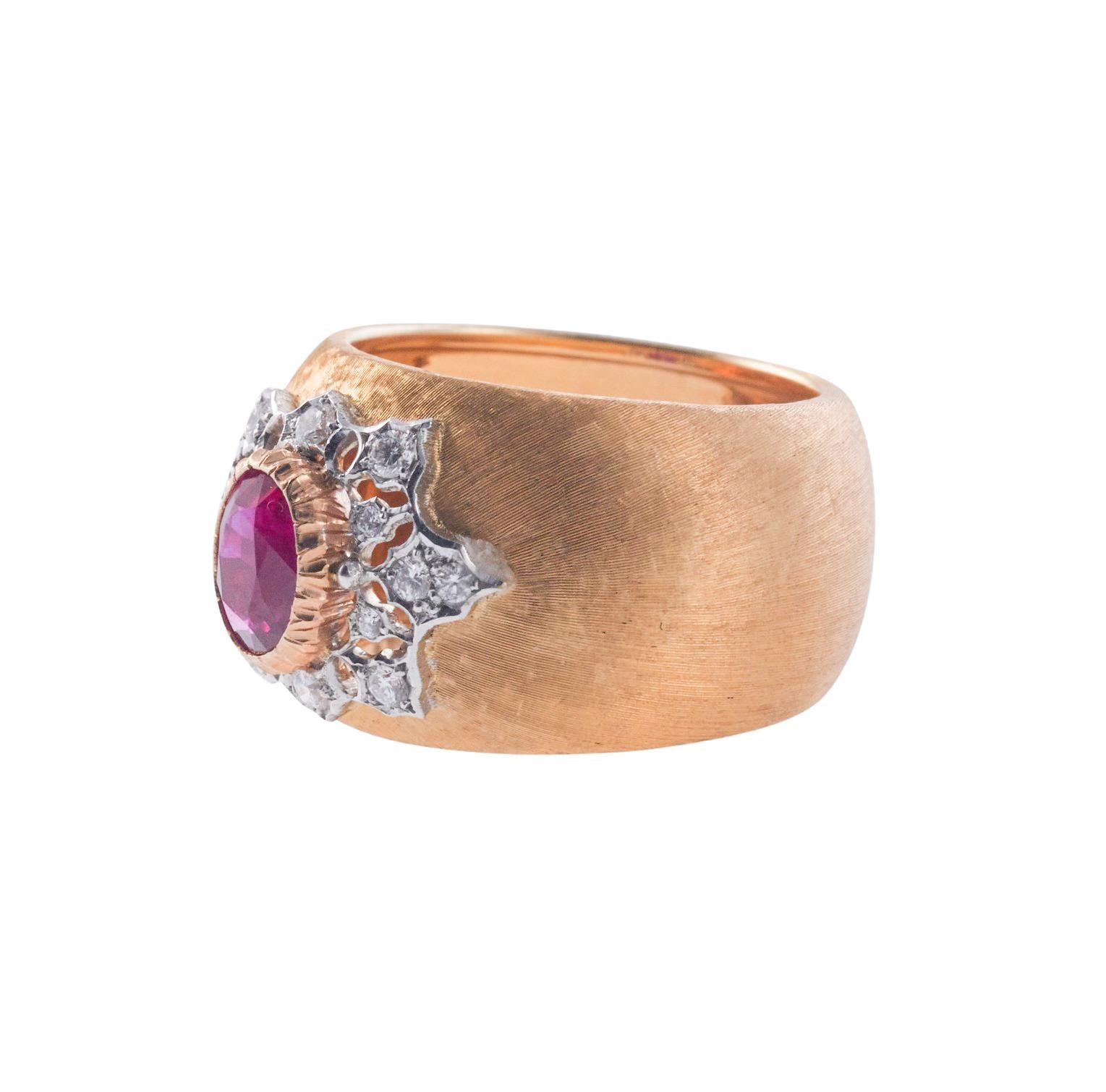 18k rose gold, Buccellati band ring, set with center certified 1.05ct Burma ruby, surrounded by approx. 0.14ctw in diamonds. Ring size is 6, top measures 13.5mm wide. Marked: Buccellati, Italy, 18k. Weight is 11.9 grams. 