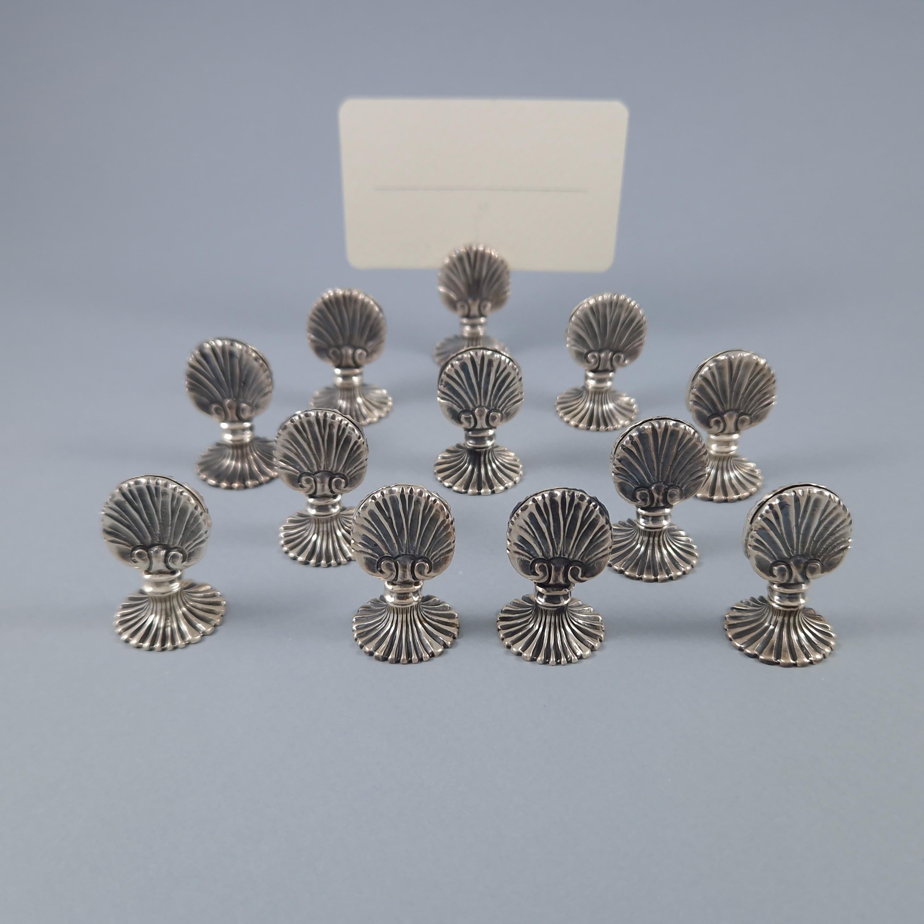 Rare set of 12 sterling silver place card holders in the shape of a shell 

Italian work from the 20th century by Buccellati 
925 silver hallmark and Silversmith's hallmark 
Height: 3.4 cm 
Diameter of the base: 2.1 cm 
Weight: 260 grams
In