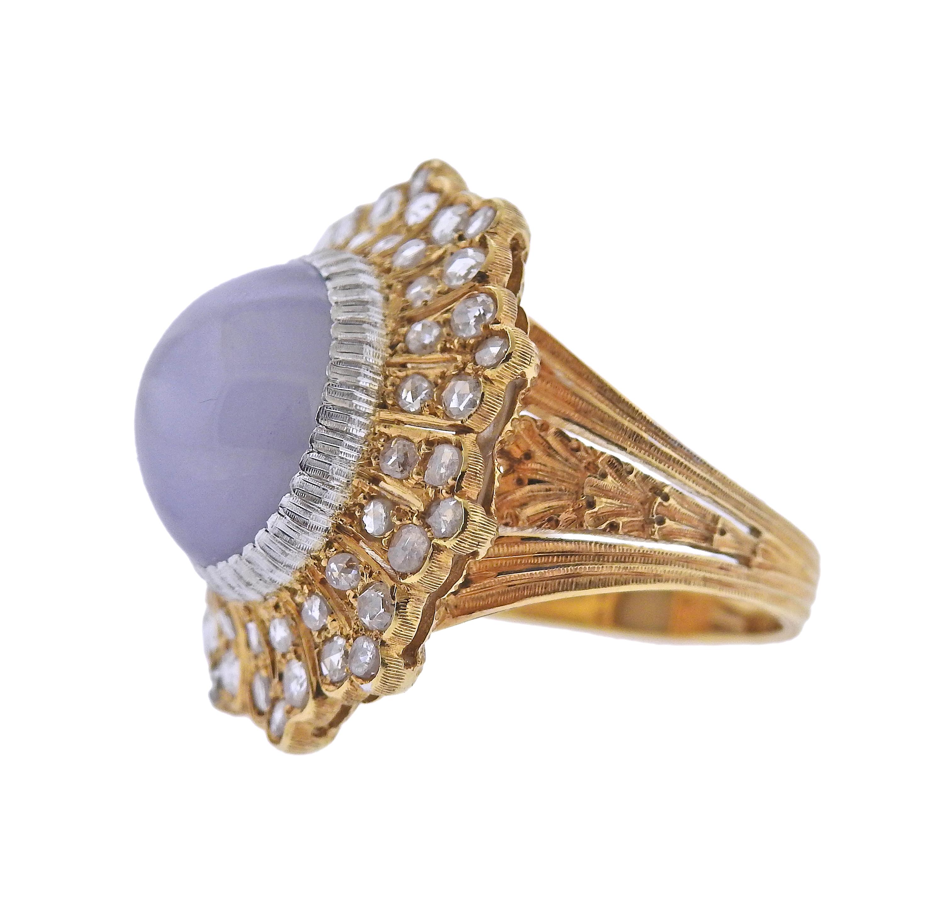 Exquisite 18k gold ring by Buccellati, with center 14.97ct star sapphire cabochon (stone measures 12.6 x 11.1 x 9.2mm) and 0.84ctw in rose cut diamonds.   Ring size - 6.5, ring top - 24mm x 22mm. Marked: Buccellati, Italy, 18k, X3065. Weight - 13.7