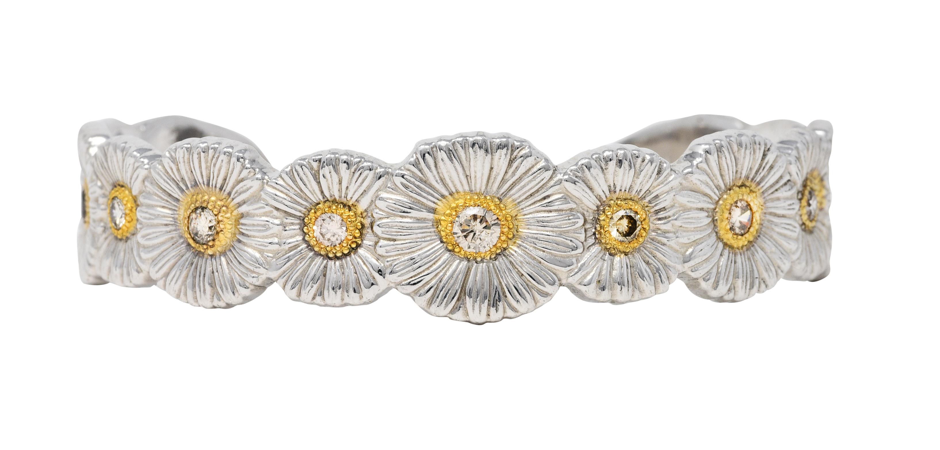 Cuff bracelet is comprised of highly rendered and deeply grooved gardenia flowers

With textured vermeil gold centers set with light brown to fancy light brown colored diamonds

Weighing in total approximately 1.50 carats with SI clarity

With