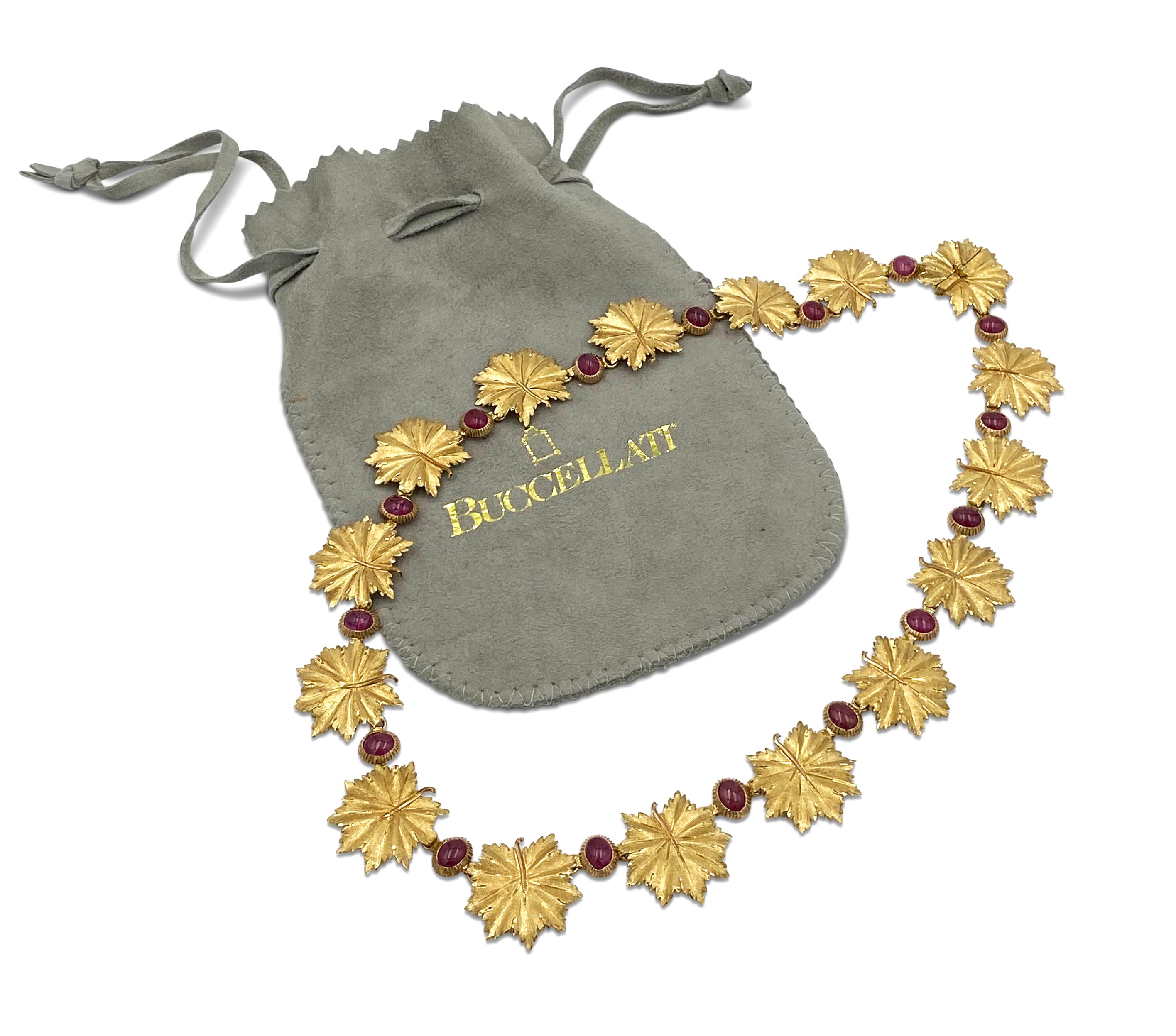 Authentic Buccellati 18 karat yellow gold leaf motif necklace set with 16 cabochon ruby stones weighing approximately 9.5 carats. Signed Buccellati, Italy 18K. The necklace is 15 1/2 inches in length. Necklace comes with original pouch. CIRCA 2010s.