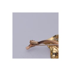 Buccellati Broche fleur en or 18 carats, émeraudes et saphirs