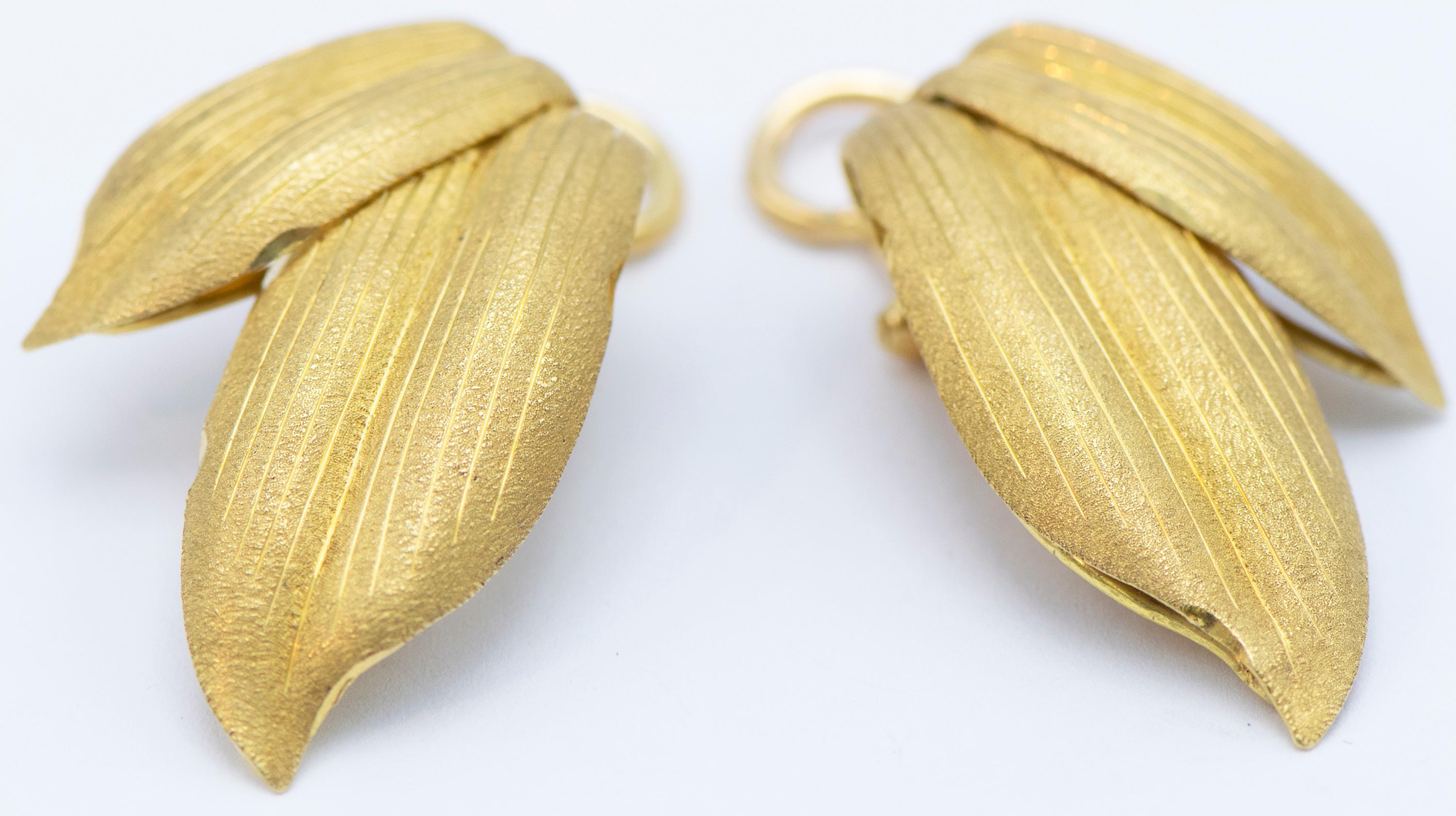Leaf design in 18Kt Yellow Gold measuring 1 1/4 inches x 0.50 inches weighing 11.9 grams in total. Signed Buccellati with a maker mark, Italy. Circa 1980