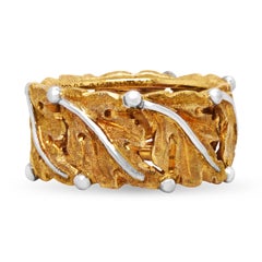 Anello Buccellati a fascia con foglia in oro giallo bianco 18 carati