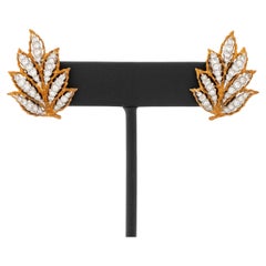 Buccellati, fermagli a forma di foglia con diamante in 18 carati