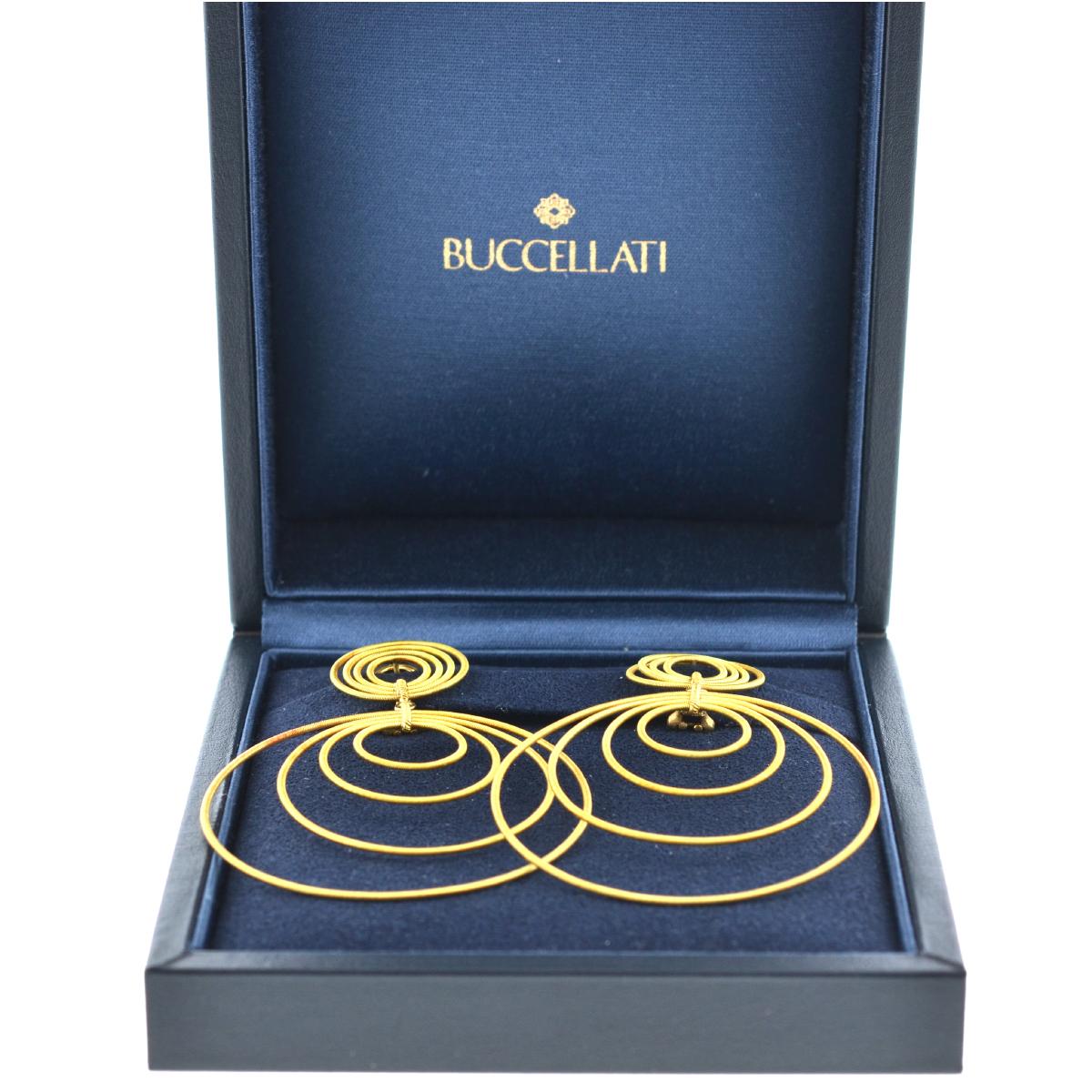 Buccellati 18k Gold Hawaii Double-Drop Earrings

Designer - Buccellati

Style - Hawaii Double-Drop Earrings

Metal - 18k Yellow Gold

Measurements - 3.25