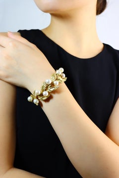 Buccellati Perlenarmband mit 18 Karat Blattgold-Motiv