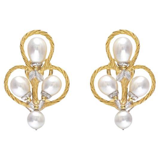 Buccellati Rete pearl chandelier earrings, each earring showcasing twelve cultured Biwa pearls suspended within a hand-textured 18k yellow and white gold lattice.  Clip backs with posts with removable chandelier bottoms.  Signed 