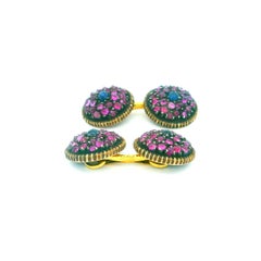 Gemelli Buccellati in oro e argento 18k con pavé di zaffiri rosa e blu al centro