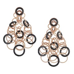 Buccellati Boucles d'oreilles hawaïennes en or rose 18 carats et onyx noir