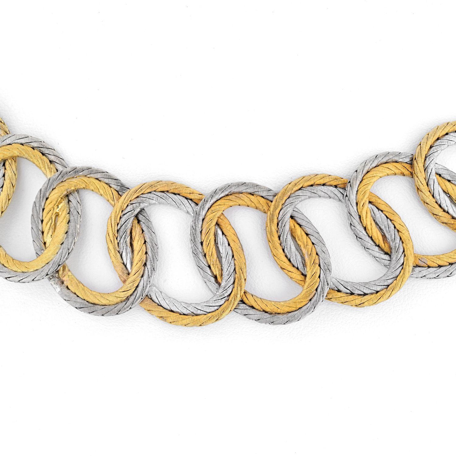 18K yellow gold and 18K white gold Buccellati collar necklace with push clasp closure and figure 8 safety.
Marks: 18K, 750, Designer Signature, Registered Trademark Number, ITALY
Measurements: 
Fits as a choker. 
15 inches.  
