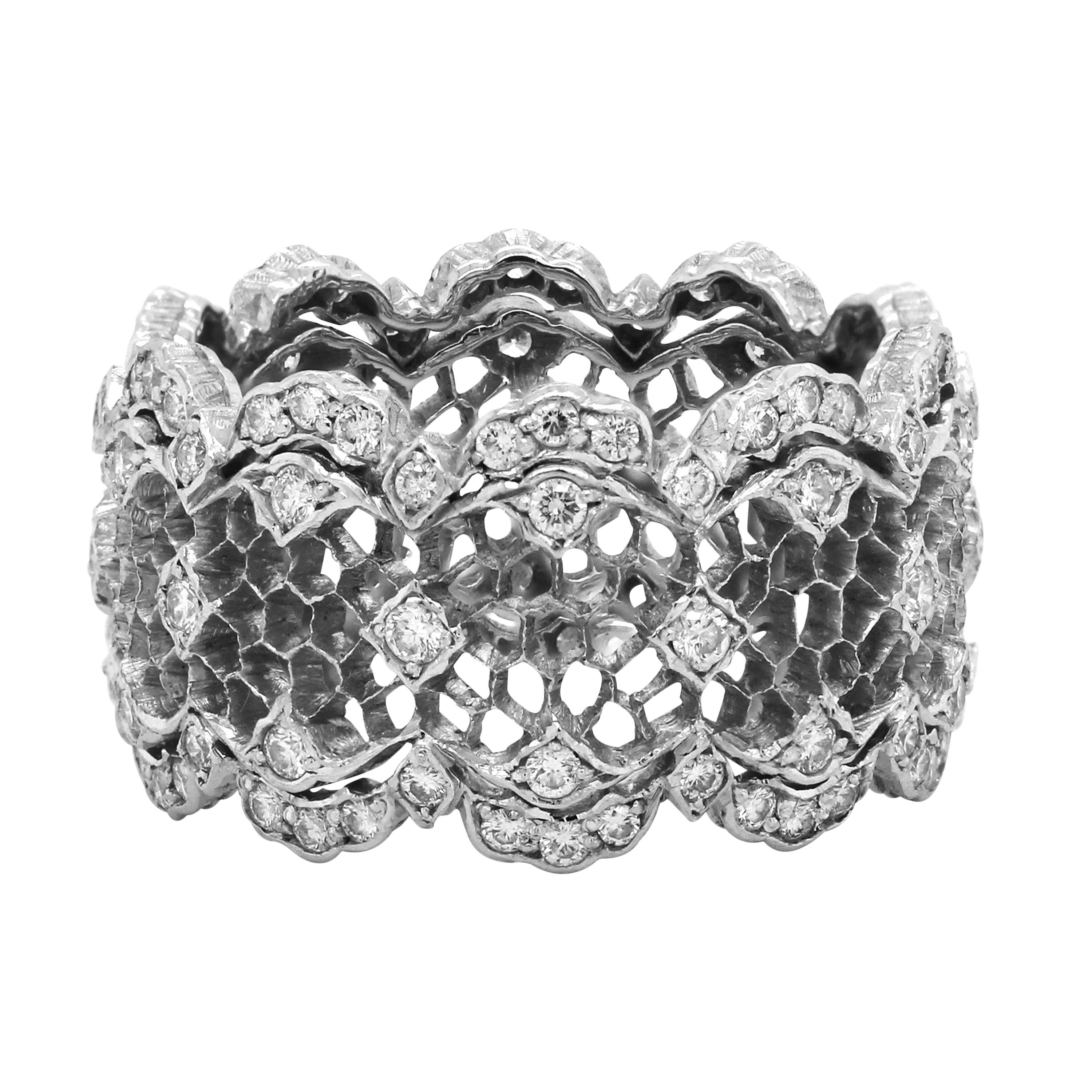 Buccellati 18K White Gold Diamond Honeycomb Tulle Ghirlanda Openwork Band Ring

This iconic band ring by Buccellati has an openwork, honeycomb design with diamonds all around.

0.86 carat G color, VS clarity diamonds total weight

12mm band