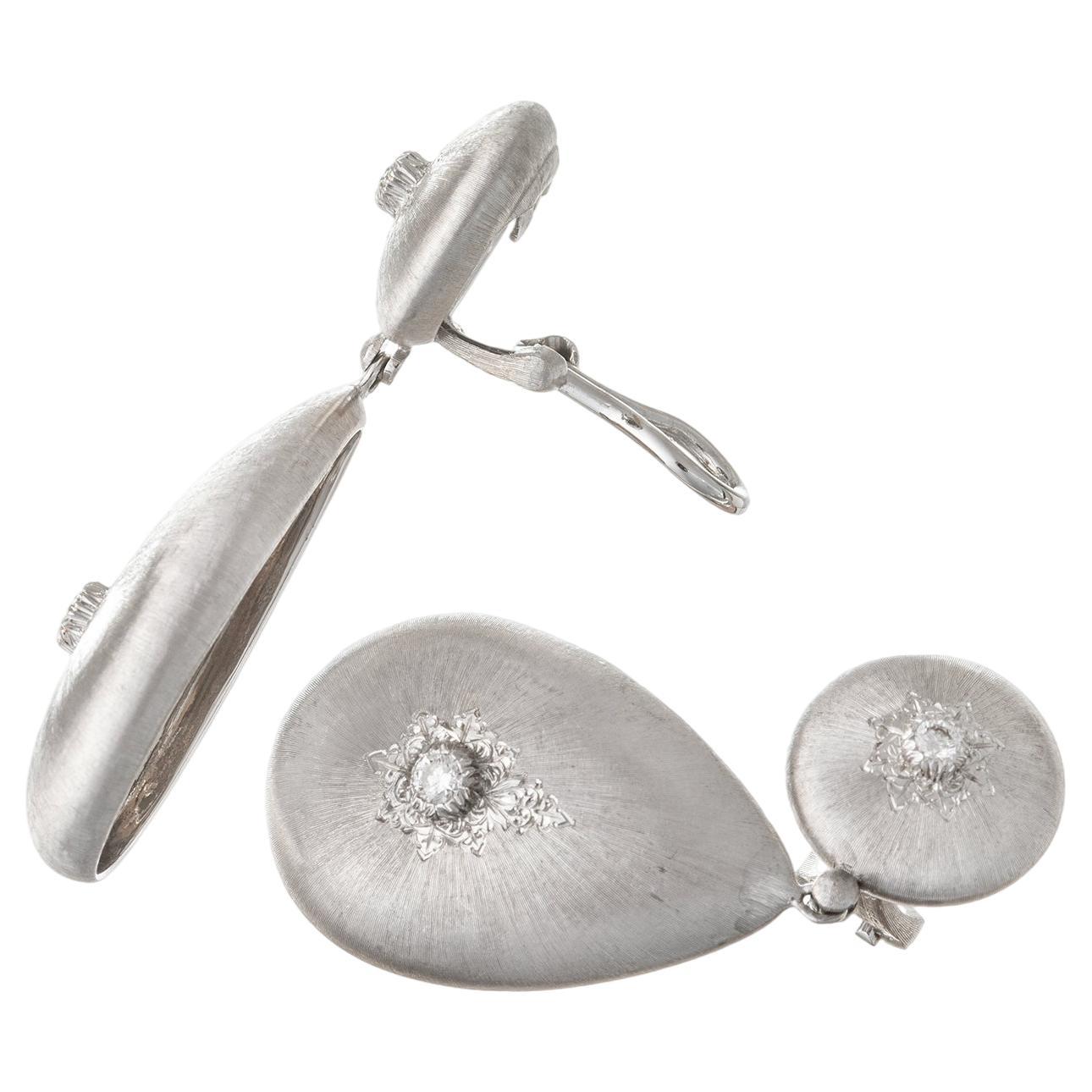 Larger-sized version of Buccellati's 'Macri Classica' earrings, featuring circular tops with teardrop bottoms both having a raised dome design in 18k white gold with the beautiful signature hand engraving of Buccellati's workshop called the 'Rigato'
