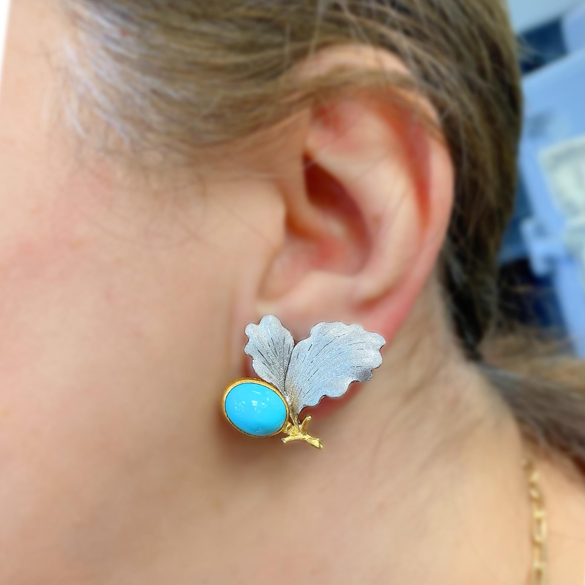 Buccellati 18K White Yellow Gold Turquoise Floral Leaf Motif Earrings

These state-of-the-art earrings by Buccellati are a masterpiece with the leaves done in 18k white gold with a satin finish and Turquoise centers.

Earrings are 0.98 inch from top
