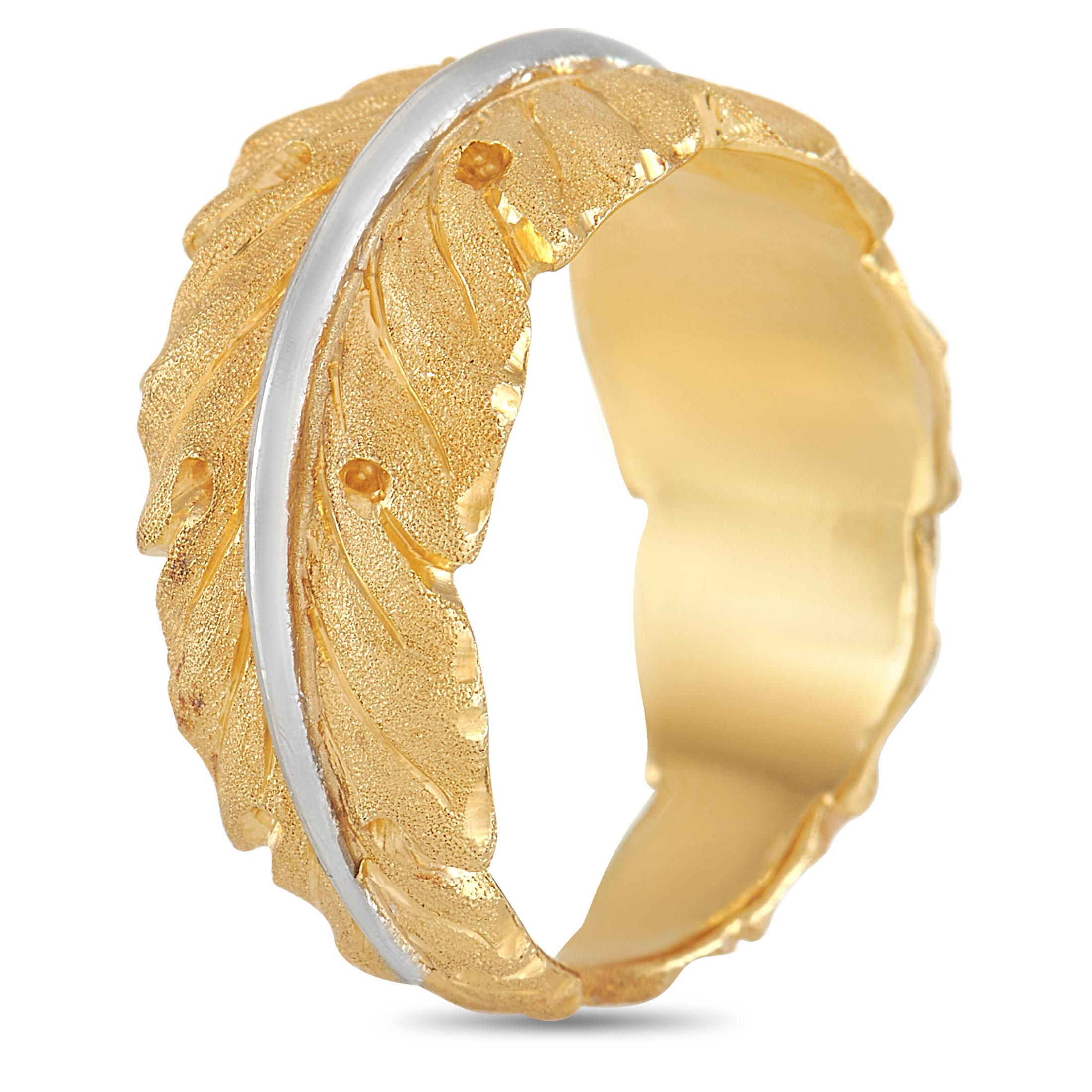 The Buccellati 18K Yellow Gold & 18K White Gold Leaf Ring is designed with an open band creatively sculpted to form a leaf-like profile. The yellow gold surface features the hand-etched engraving Buccellati is renowned for. On its center is a solid