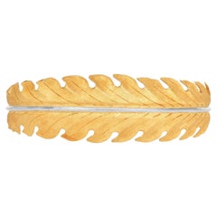 Bracciale a foglia in oro giallo e bianco 18 carati Buccellati