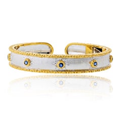 Pulsera «Macri Capri» de Buccellati, en oro amarillo y blanco de 18 quilates con zafiros