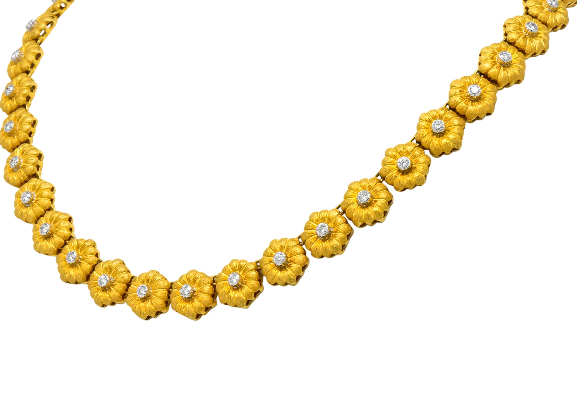 With rich textured gold flower links, with engraved gold detail

Each centering a round brilliant cut diamond in white gold

Thirty-eight diamonds, weighing approximately 1.90 carats total, G/H color and VS clarity
 
Completed by concealed clasp