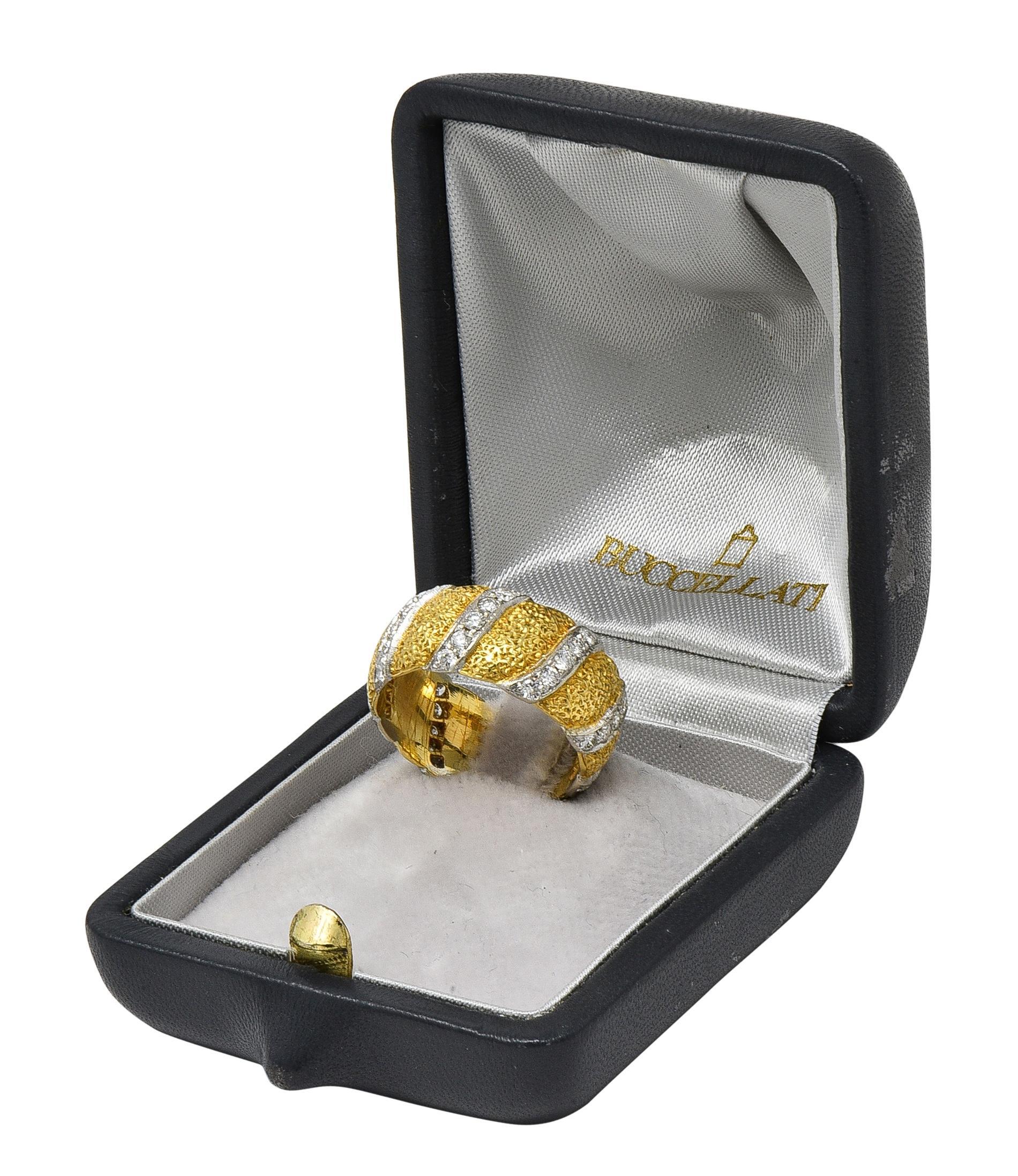Designed as a wide yellow gold band with very fine 