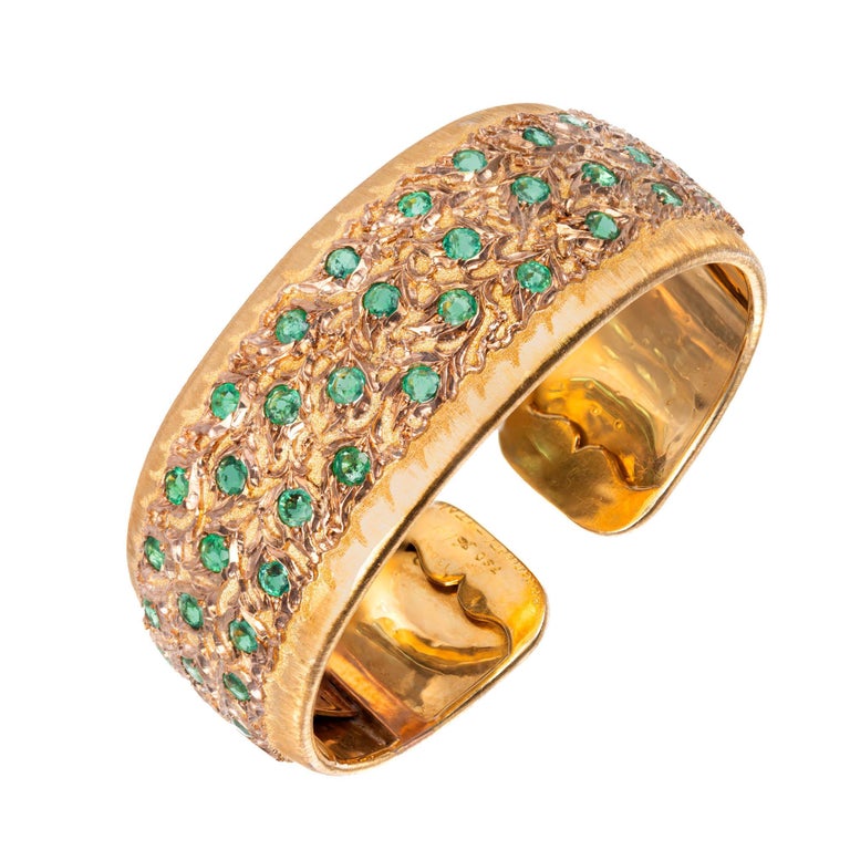 Buccellati 4.16-carat emerald and yellow- and rose-gold cuff bracelet, 1940s