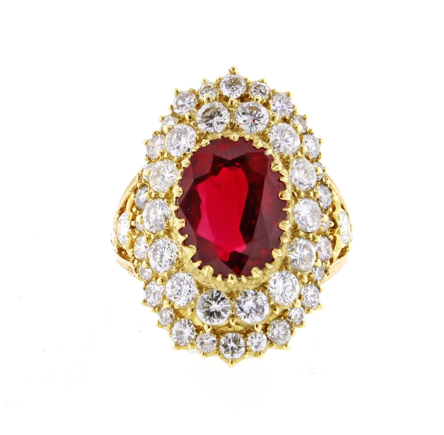 From Italian designer Buccellati, an impressive ruby and diamond ring. The ring features an oval gem ruby weighing 4.82 carats and 46 brilliant diamonds weighing approximately 3.15 carats. Handmade by Buccellati in 18 karat pink and yellow gold. The