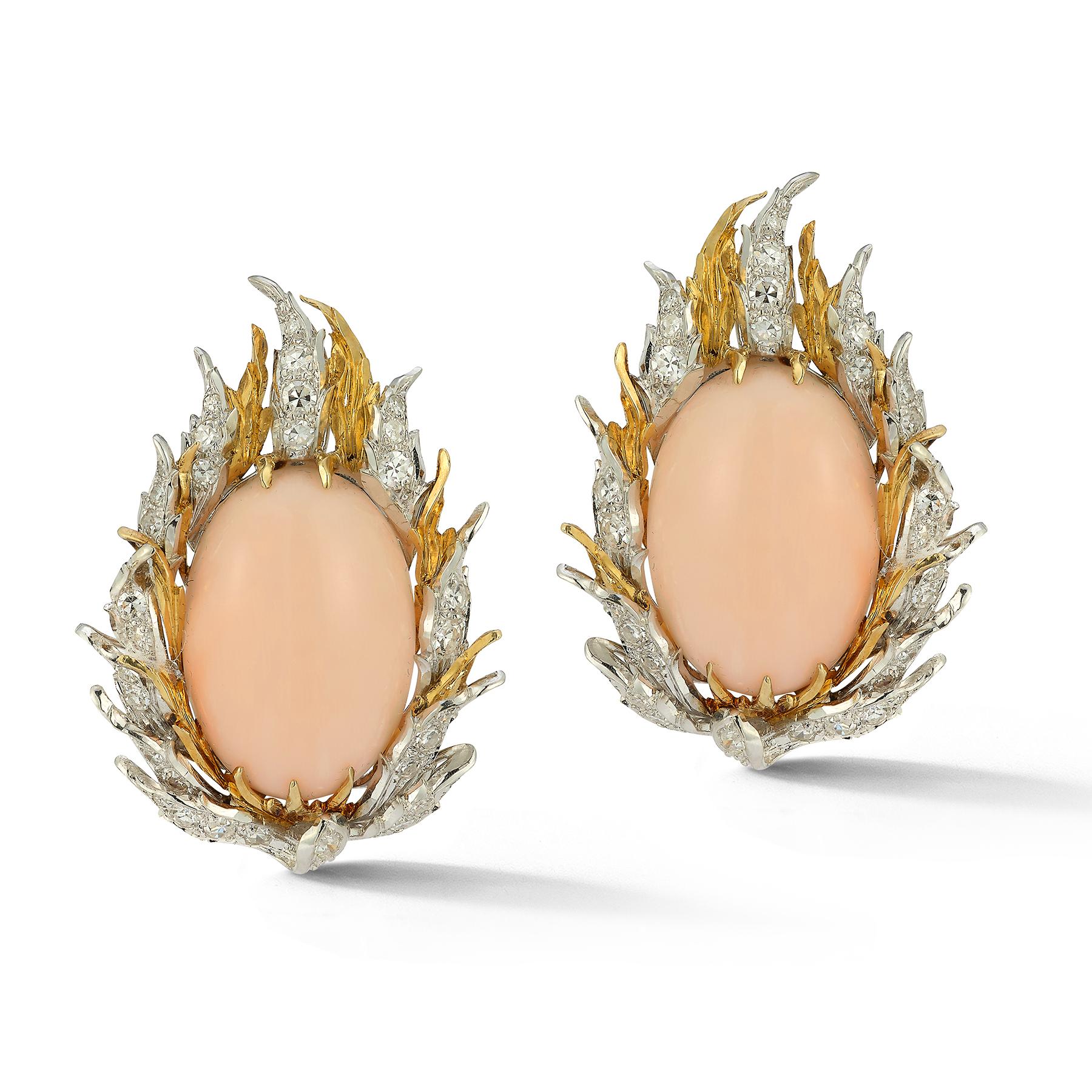 Buccellati Angel Skin Cabochon Coral & Diamond Earrings

2 cabochon corals surrounded by round cut diamonds set in 18k white & yellow gold.

Measurements: 1.5