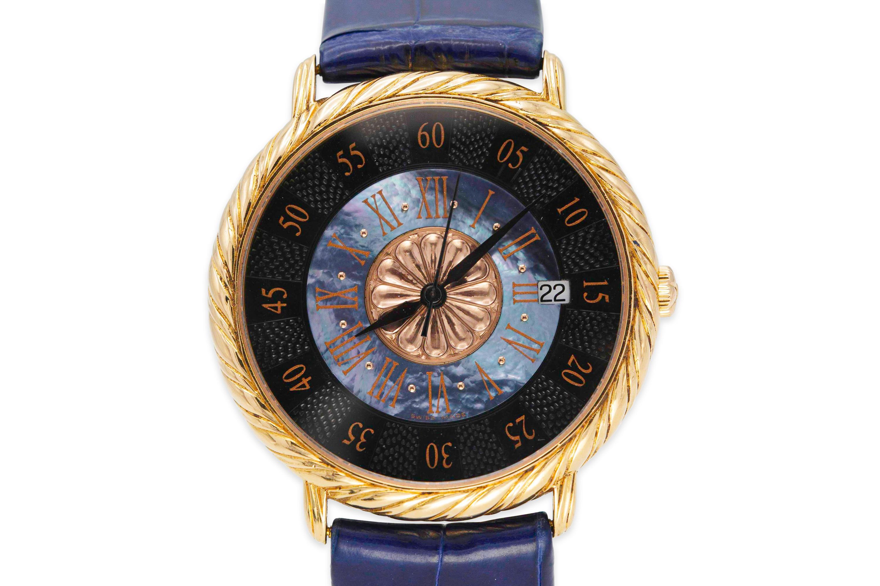 Finely crafted in 18k rose gold with a Black Mother of Pearl face and blue alligator straps.
Signed by Buccellati
40 mm face
Model #511