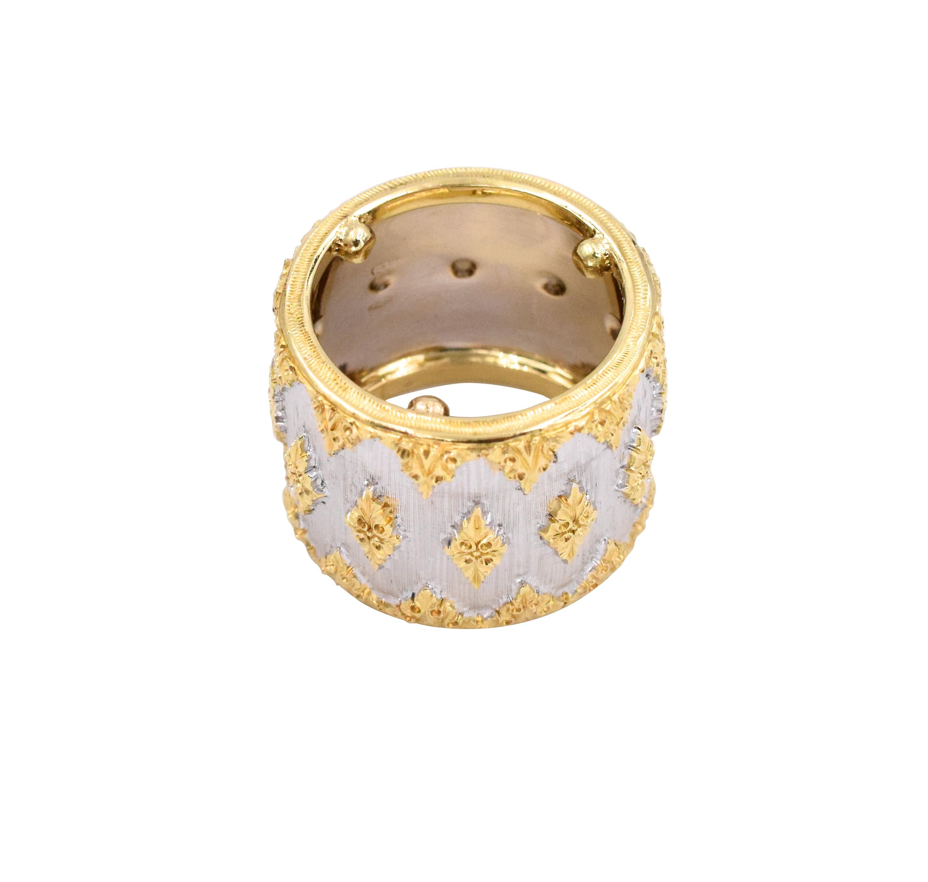 Buccellati Two Tone Gold Wedding Band. This wedding band has an intricate design with both 18k yellow and white gold
Signed: M.Buccellati  ( Mario Buccellati)
Width is 17.25 mm
Ring size is 71/4