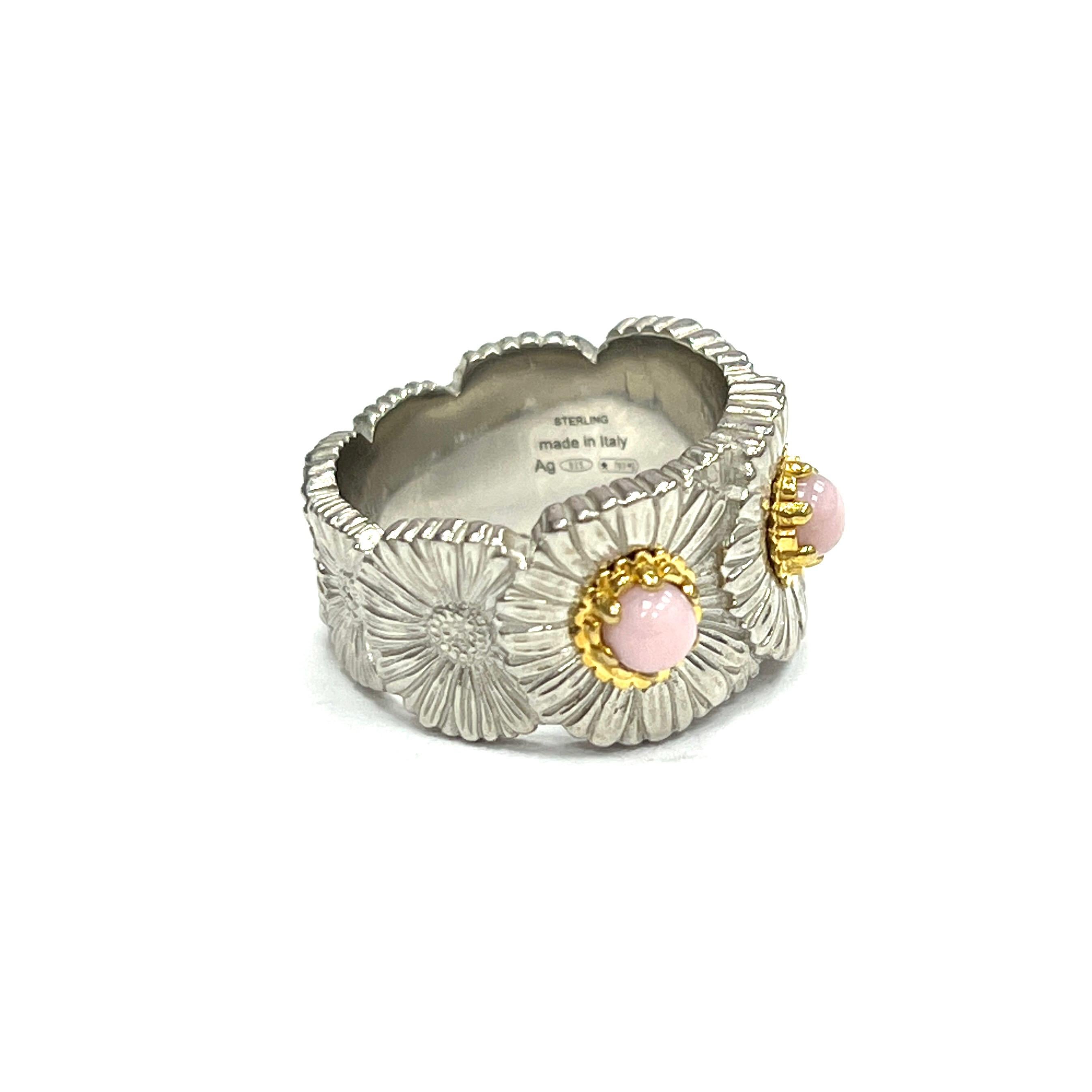 Buccellati Blossoms Daisy Pink Opal Sterling Silver Ring, Italian

Daisy flowers made of sterling silver with cabochon pink opal of approximately 0.50 carat; marked Buccellati, Made in Italy, Sterling, 925, 55

Size: 7 US; 55 Europe
Total weight: