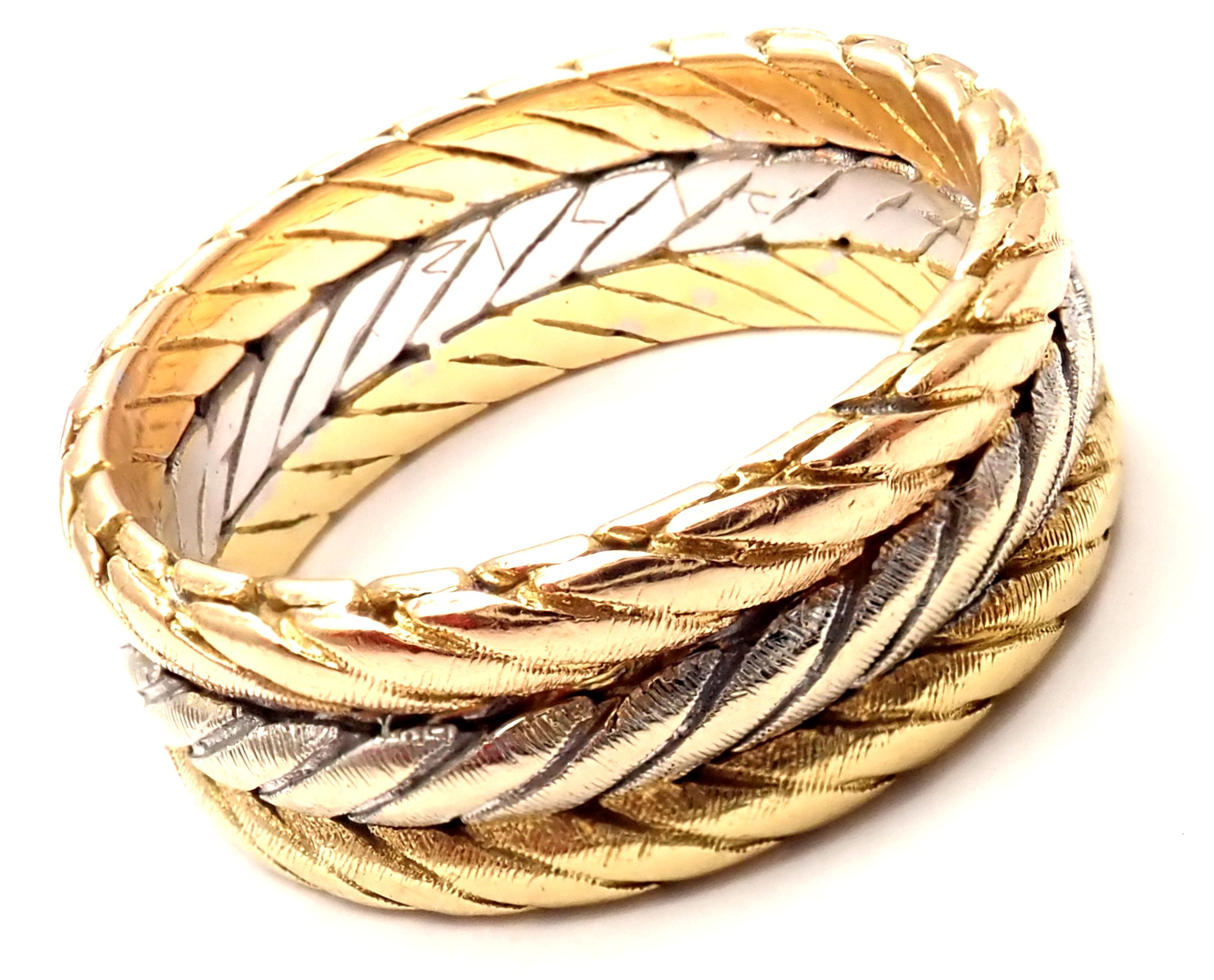 18k Tri-Color Gold Braided Band Ring by Buccellati.
Details: 
Size: 6
Weight: 7.3 grams
Measurements:	7mm band
Stamped Hallmarks: Buccellati Italy 18k
*Free Shipping within the United States*
YOUR PRICE: $1,350
T2486eod