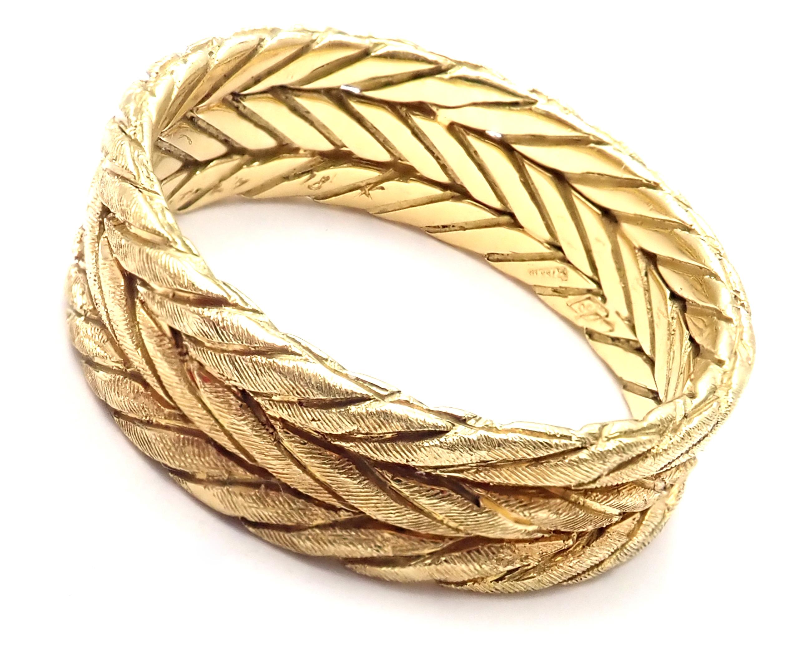 18k Yellow Gold Braided Band Ring by Buccellati.
Details: 
Size: 6.5
Weight: 5.5 grams
Width:	7mm
Stamped Hallmarks: Buccellati Italy 18k
*Free Shipping within the United States*
YOUR PRICE: $1,150
T2487eod