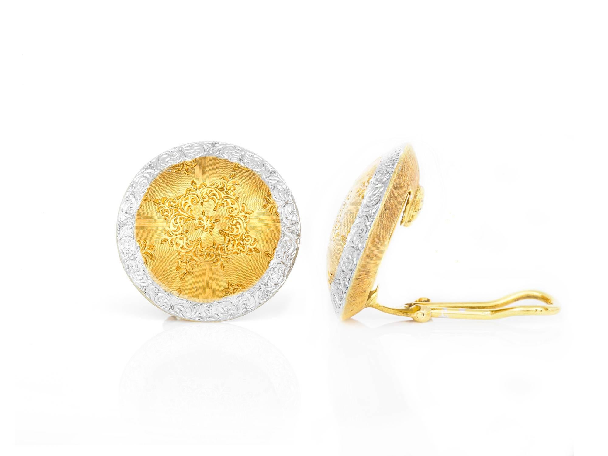 Signed Buccellati button earrings finely crafted in 18k yellow and white gold. 