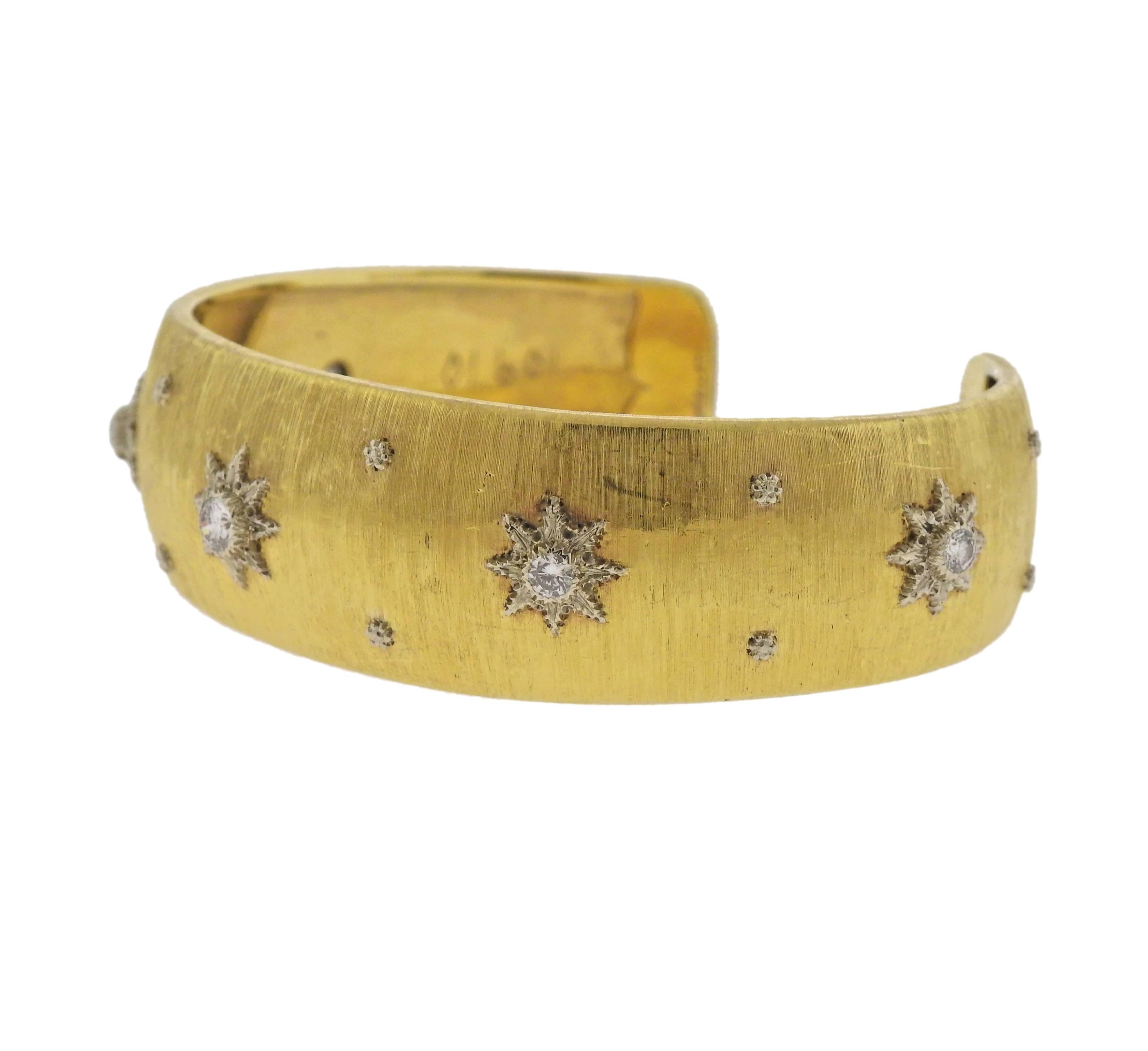 Classic 18k gold cuff bracelet by Buccellati, set with approx. 0.60ctw in diamonds. Bracelet will fit approx. 7