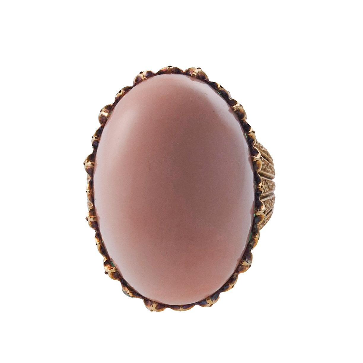 Buccellati 18k gold ring, set with coral and emeralds. Ring size 6.5., top measures 25mm x 19mm. Marked: Buccellati, Italy, 18K. Weight is 19.2 grams.