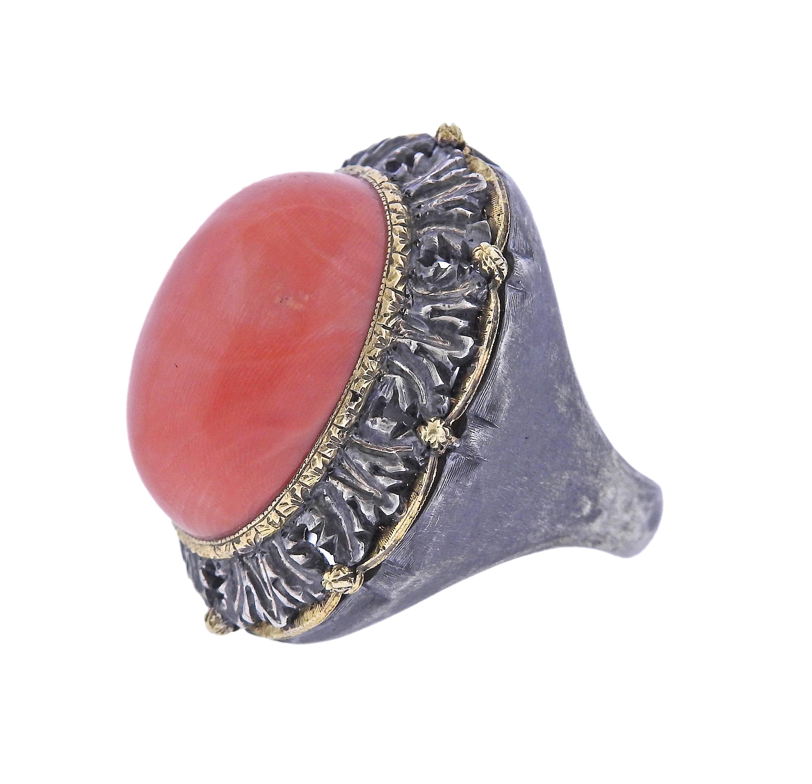 Large 18k gold and sterling silver ring by Buccellati, with 23.2 x 15.4mm coral. Ring size - 6.75, ring top is 33mm wide. Marked: Buccellati. Weight - 23.5 grams.