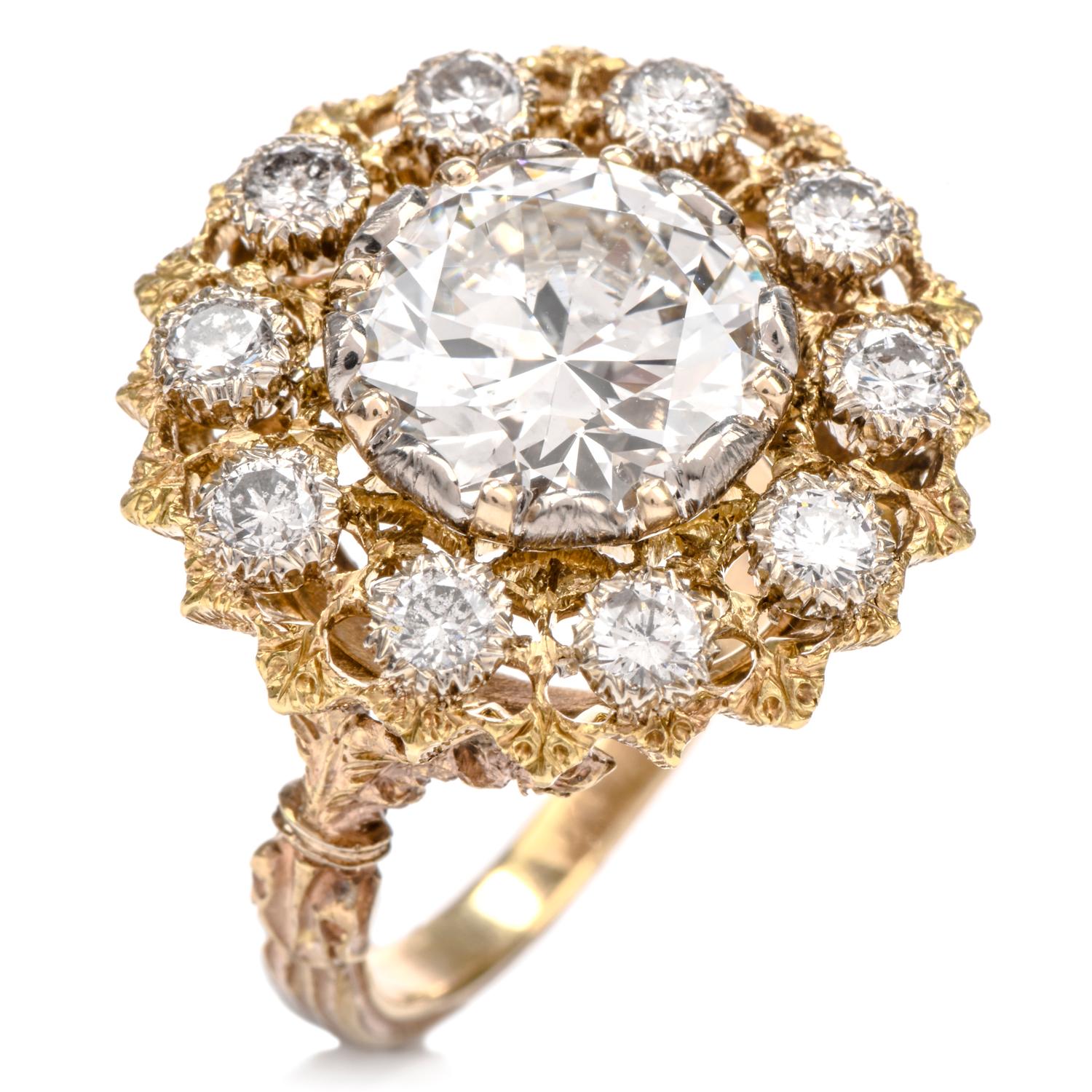 This exquisite vintage diamond Buccellati engagement cocktail ring was inspired by a 

natural flower motif and crafted in 18K yellow gold.

Prominently showcased in the center of this ring is one diamond

weighing appx. 3.21 carats and is graded as