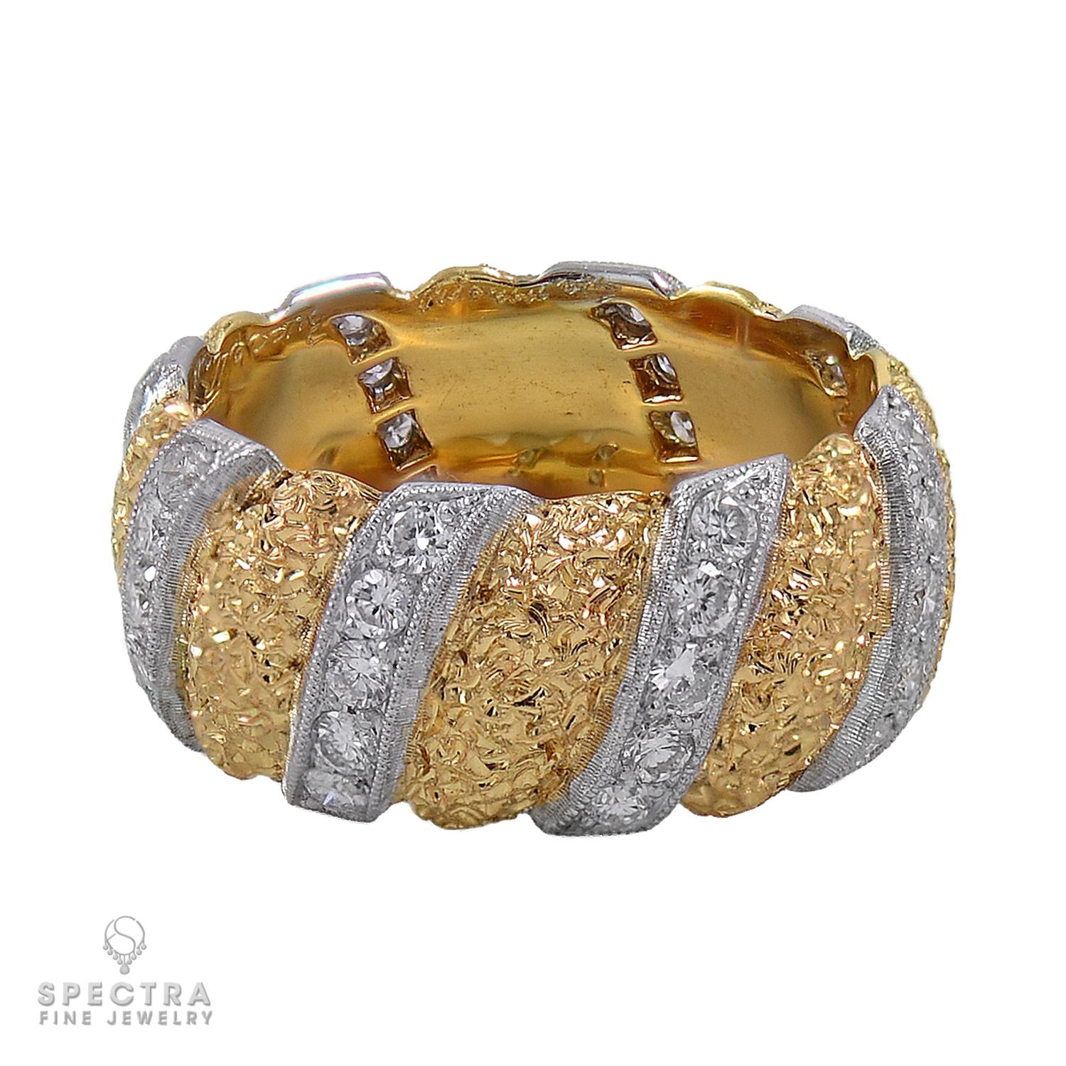 The ring is set with round brilliant-cut diamonds, weighing a total of approximately 0.77 carat, with F-G color and VS clarity. Width measures 5/16 inch.
Ring size 5.5.
Weight 7.55 grams.
Signed: Buccellati; Numbered: y1617; Stamped: 750, 18K,