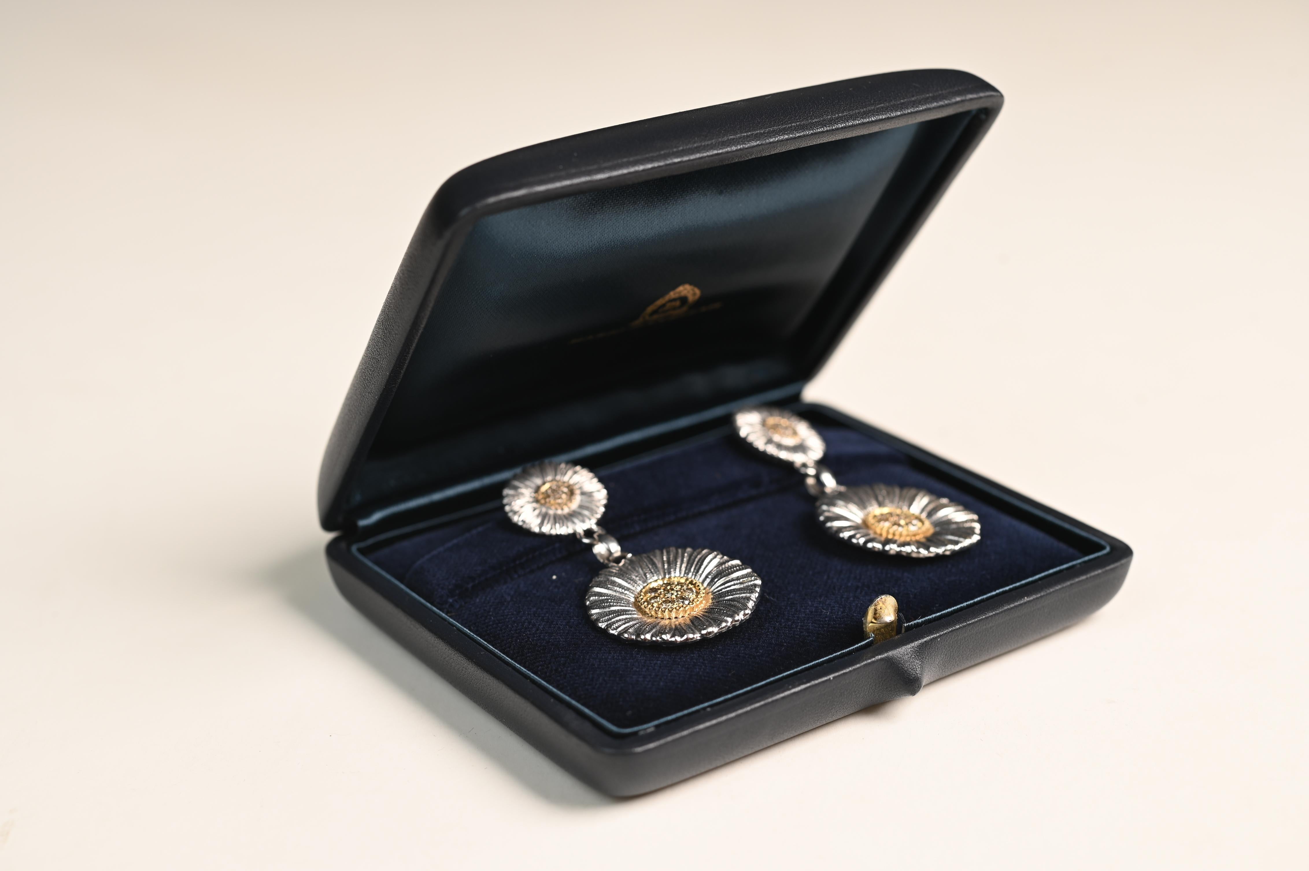 Experience the timeless elegance of Buccellati with these exquisite two-blossom earrings, masterfully crafted in Italy. Each earring features a central floral cluster of fancy brown diamonds, their warm, earthy tones set beautifully in rich 14k