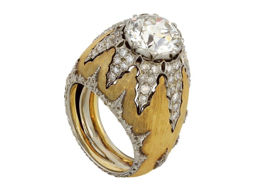 Buccellati diamond cluster ring. Set to centre with a round old cut diamond in an open back claw setting with an approximate weight of 2.90 carats, further set with fifty four round eight-cut diamonds in open back grain settings with a combined