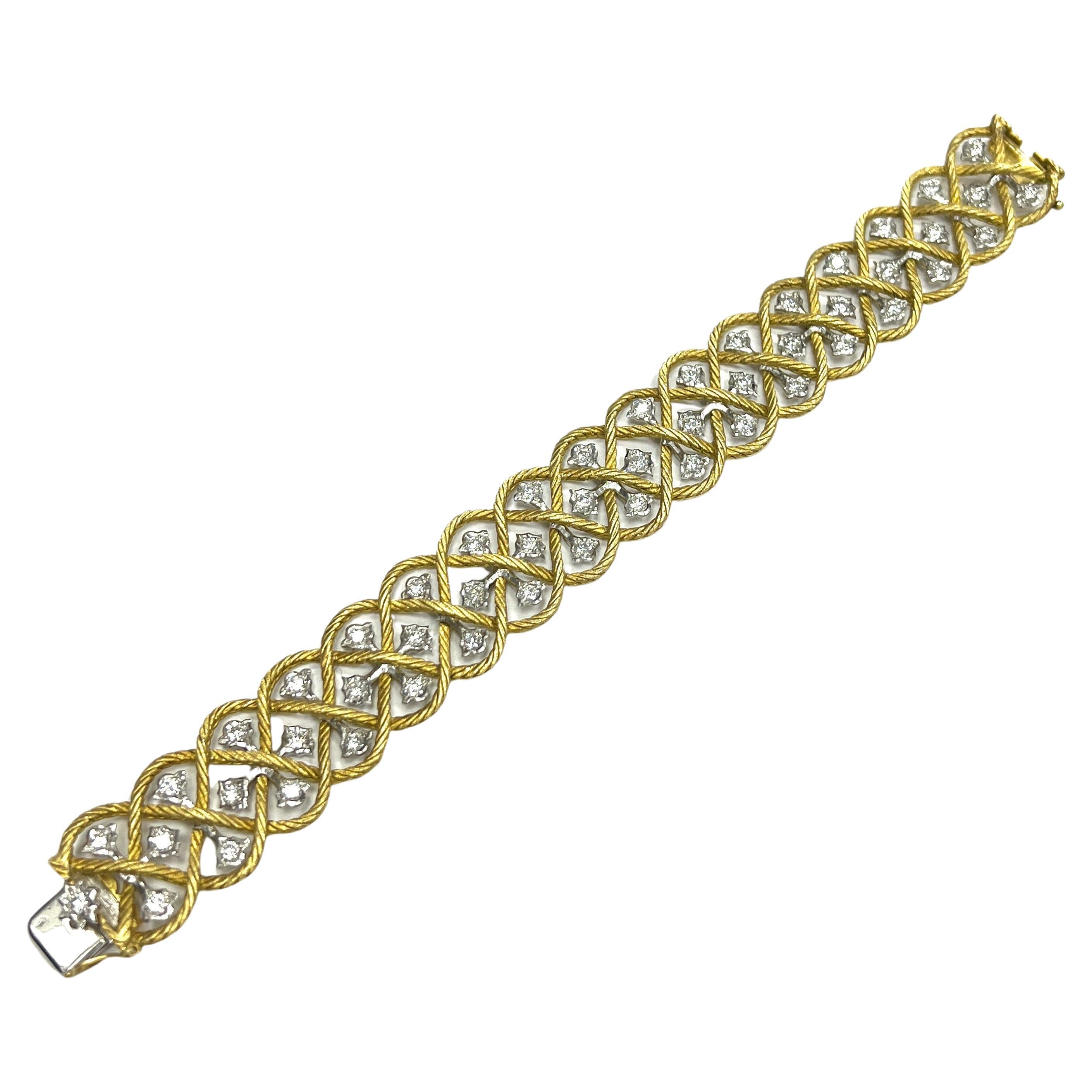 Buccellati diamond gold bracelet, Italian

Created by Gianmaria Buccellati, an 18 karat yellow gold bracelet with braided rope motif, round-cut diamonds; marked Gianmaria Buccellati, 18kt, Italy, 750

Size: width 0.81 inch, length 7 inches
Total