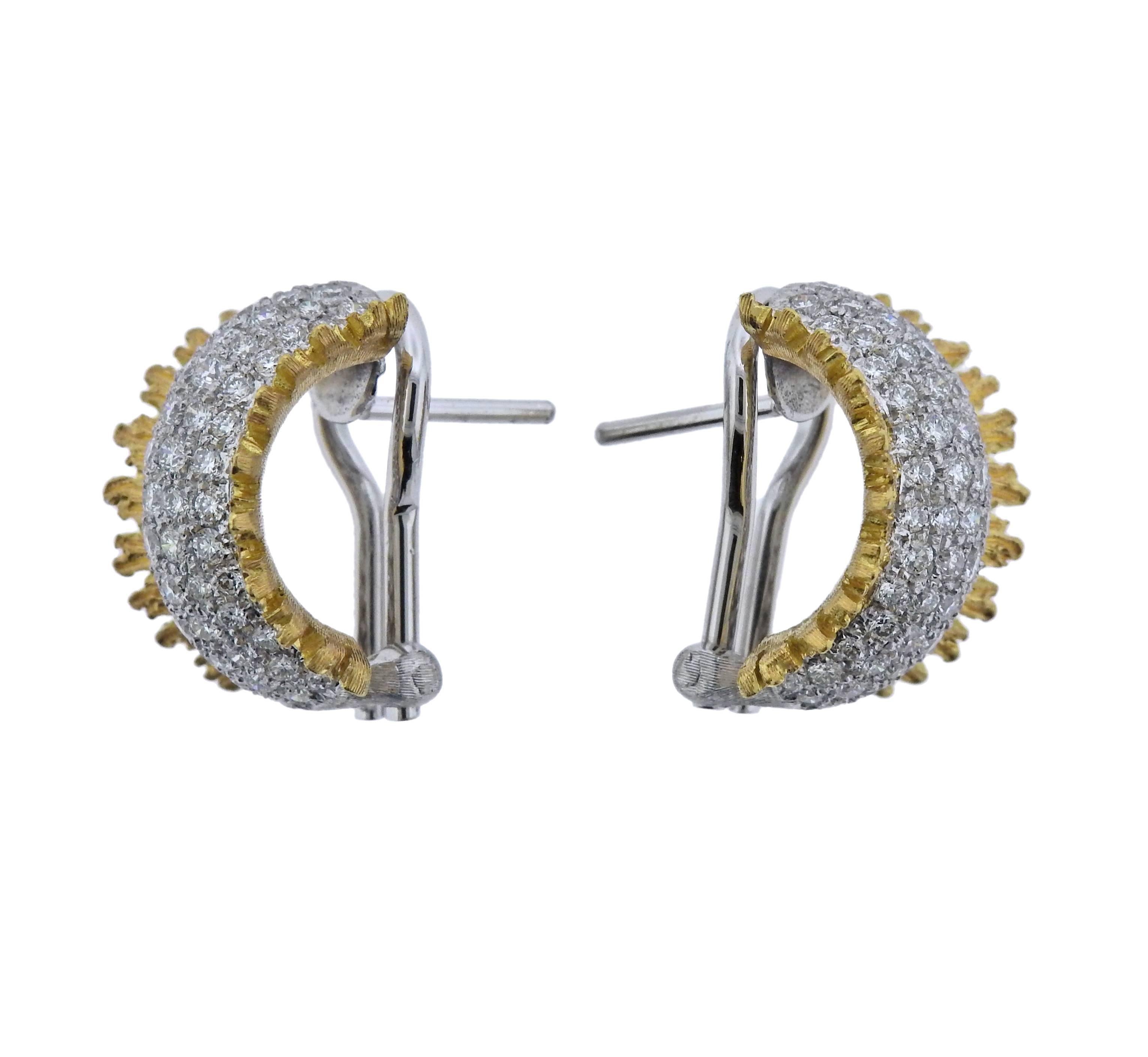 18k yellow and white gold hoop earrings, crafted by Buccellati, set with approx. 1.40ctw in H/VS diamonds. Retail $20900. Earrings 16mm x 11mm, weigh 9.7 grams. Marked: Buccellati, 750, Italy, M6272.