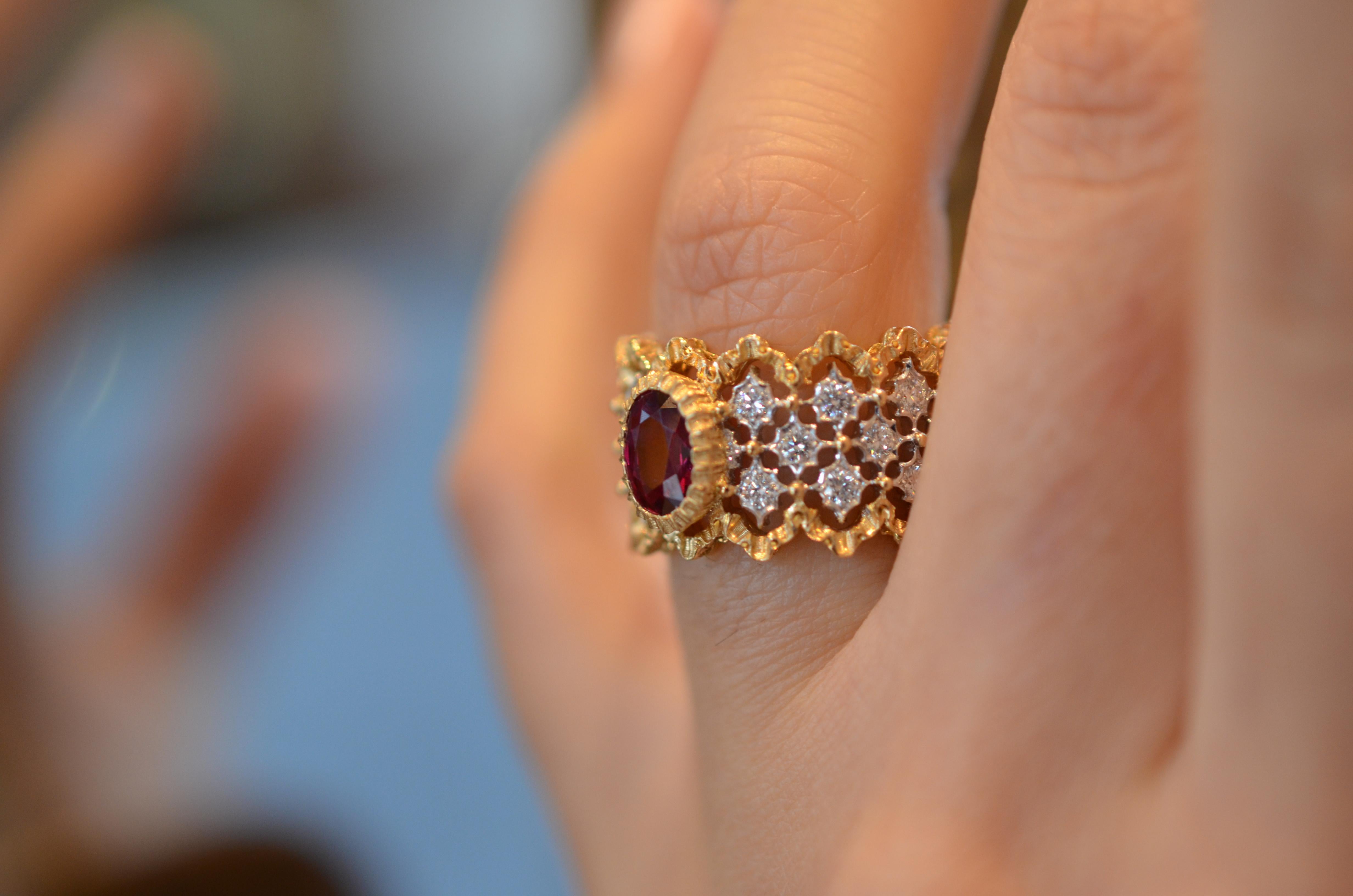 A stunning and rare Buccellati Ruby Ring, adorned with fine white gold openwork. 

Eternelle openwork ring in white gold with three rows of rhombs set with 0.93ct brilliant-cut diamonds. Scalloped border in rouches modelled yellow gold. 

The center