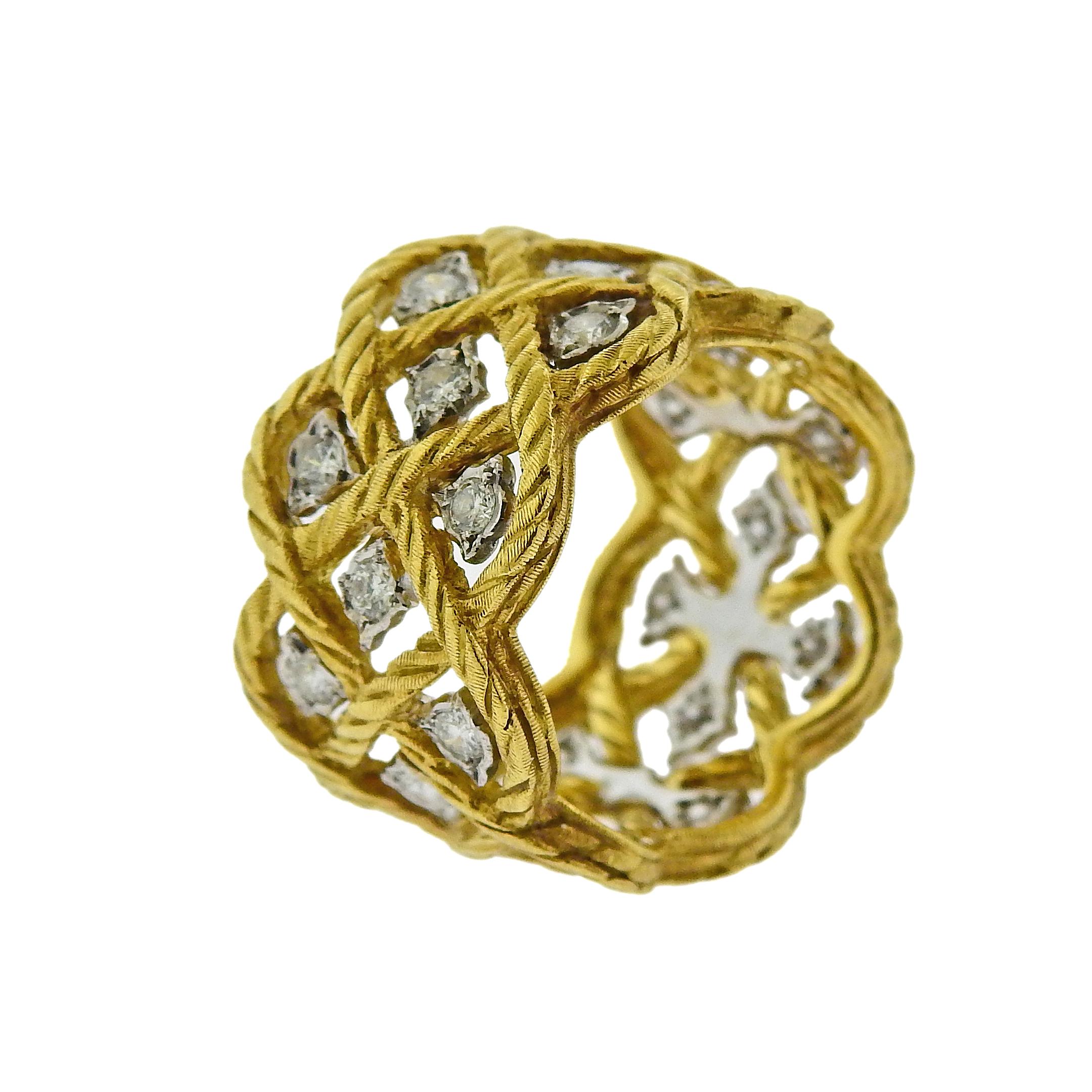Beautiful 18k yellow gold Etoilee wide band ring, crafted by Buccellati, adorned with approx. 0.72ctw in H/VS-SI diamonds.  Ring size - 5.5, ring is 14mm wide.  Weighs 9 grams. Marked: Ring size - 5.5, ring is 14mm wide.