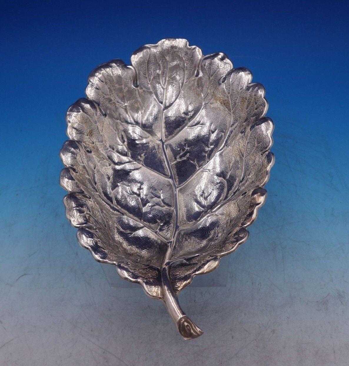 Buccellati

Lovely Gianmaria Buccellati sterling silver dish in the form of an oak leaf. This dish measures 2