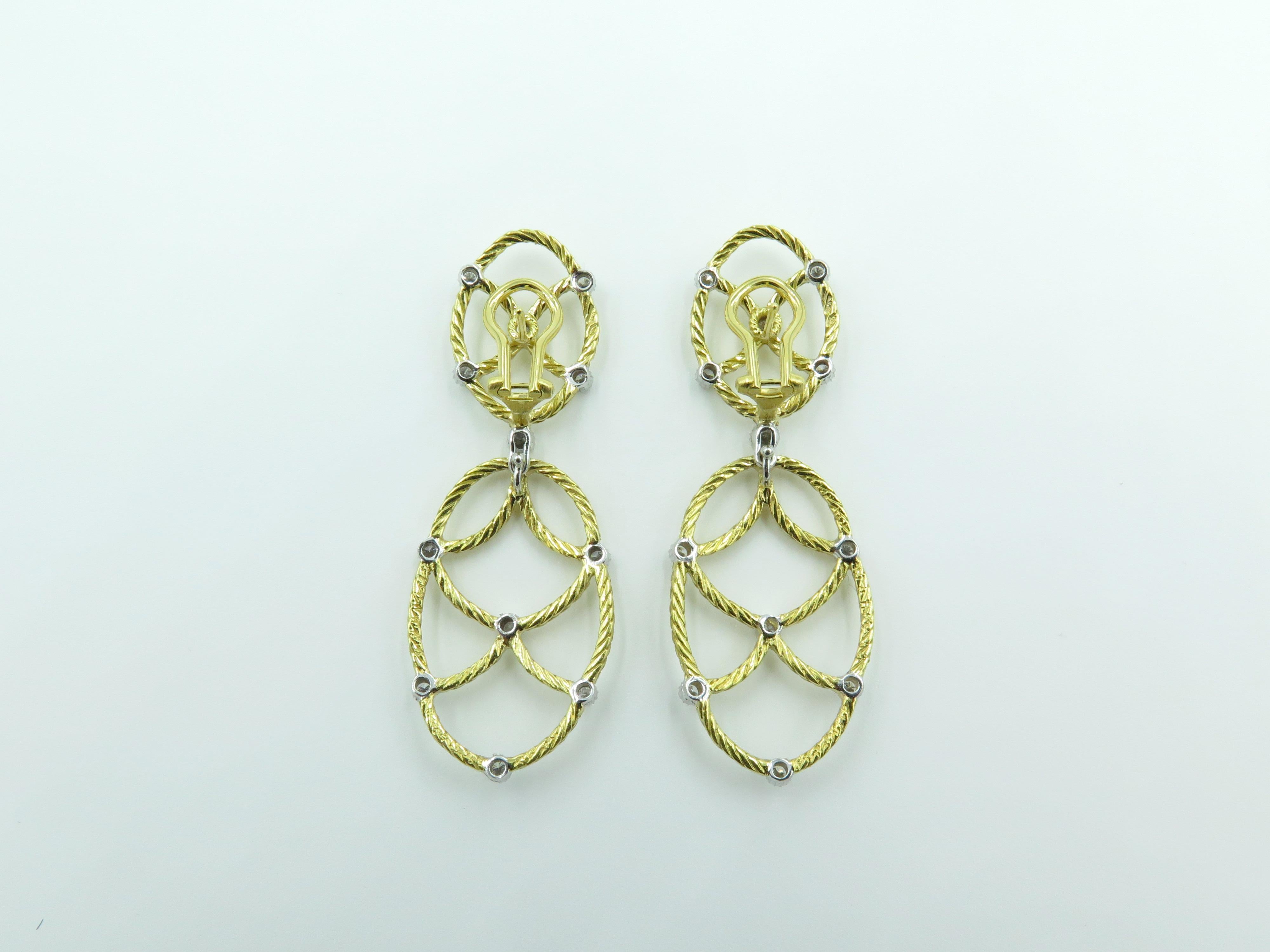 A pair of 18 karat yellow gold and diamond earrings. Buccellati. From the Etoilee collection. Designed as openwork rope work knotted drops, from a similarly designed surmount, enhanced by circular cut diamonds. Twenty four (24) diamonds weigh