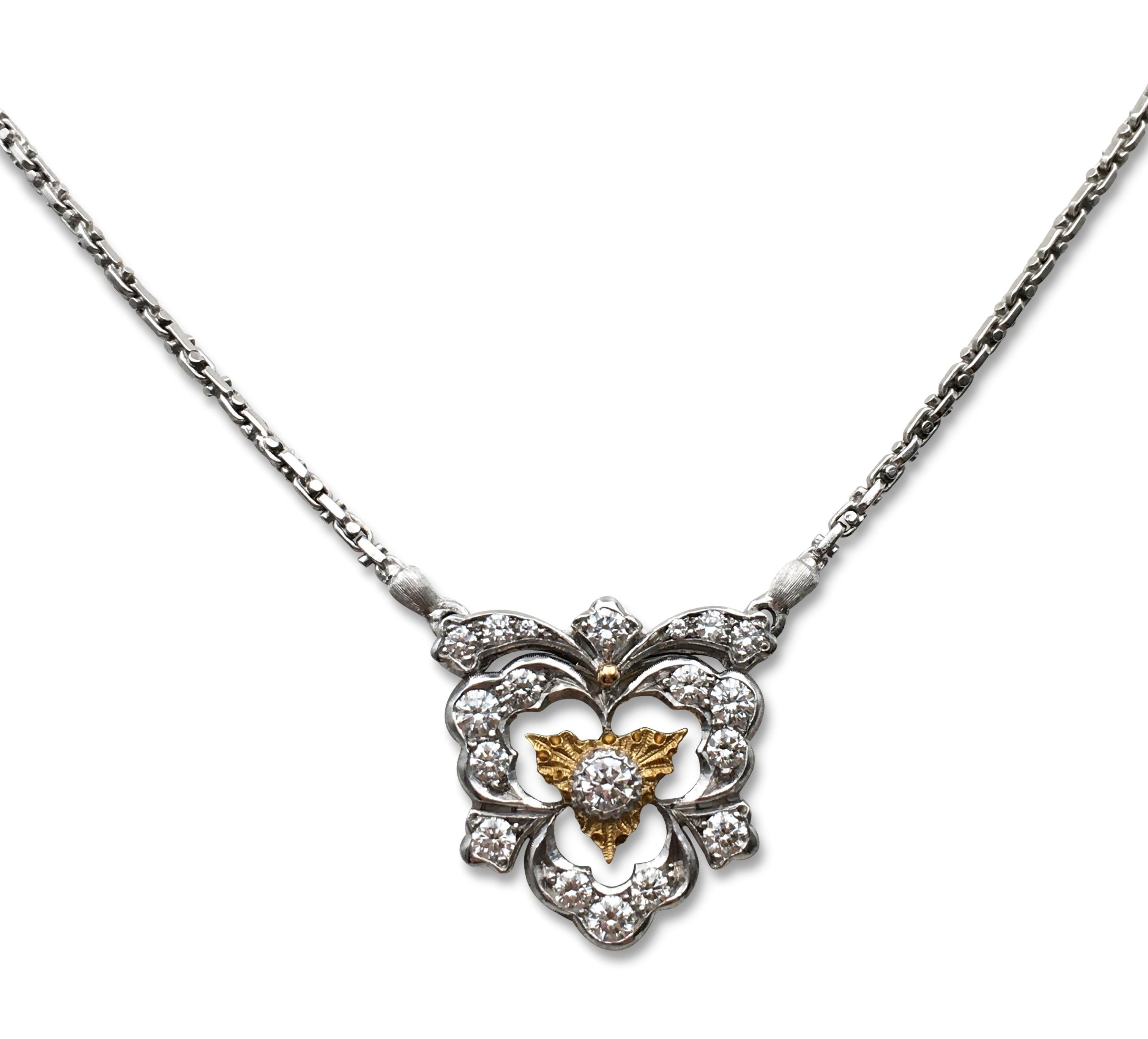 Authentic hand-made Buccellati necklace crafted in 18 karat white and yellow gold. The necklace is strung with a pendant that is set with an estimated 0.90 carats of high-quality round brilliant cut diamonds. Signed Buccellati Italy, 18K, with
