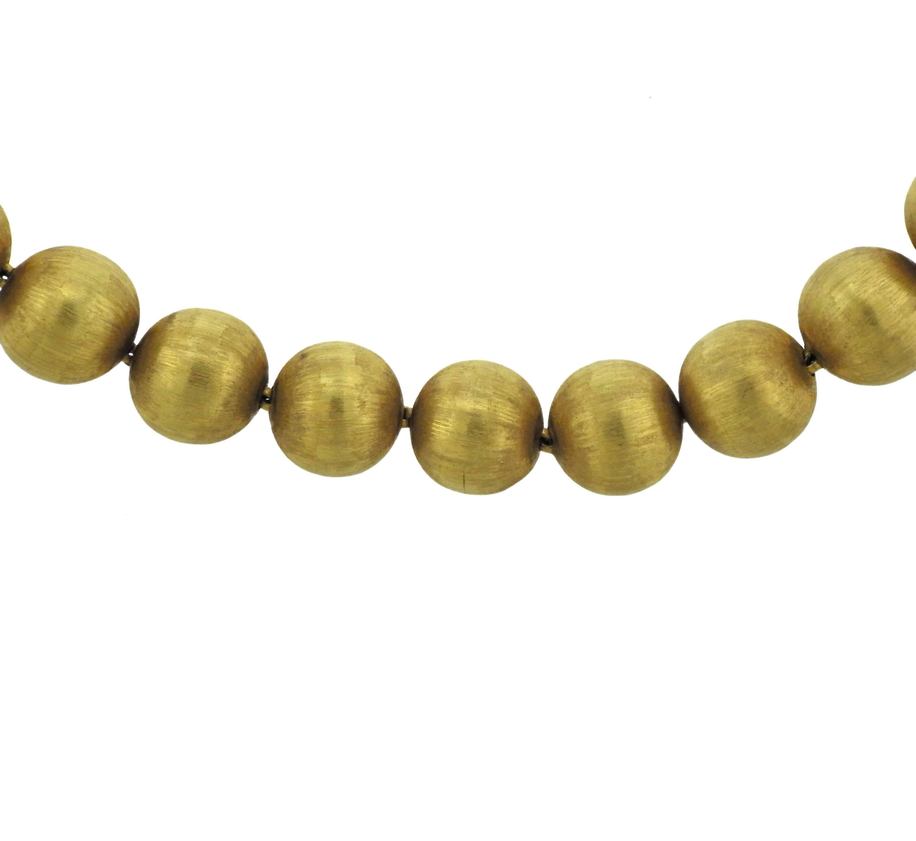  18k yellow gold bead necklace, crafted by Buccellati. Necklace is 16.75