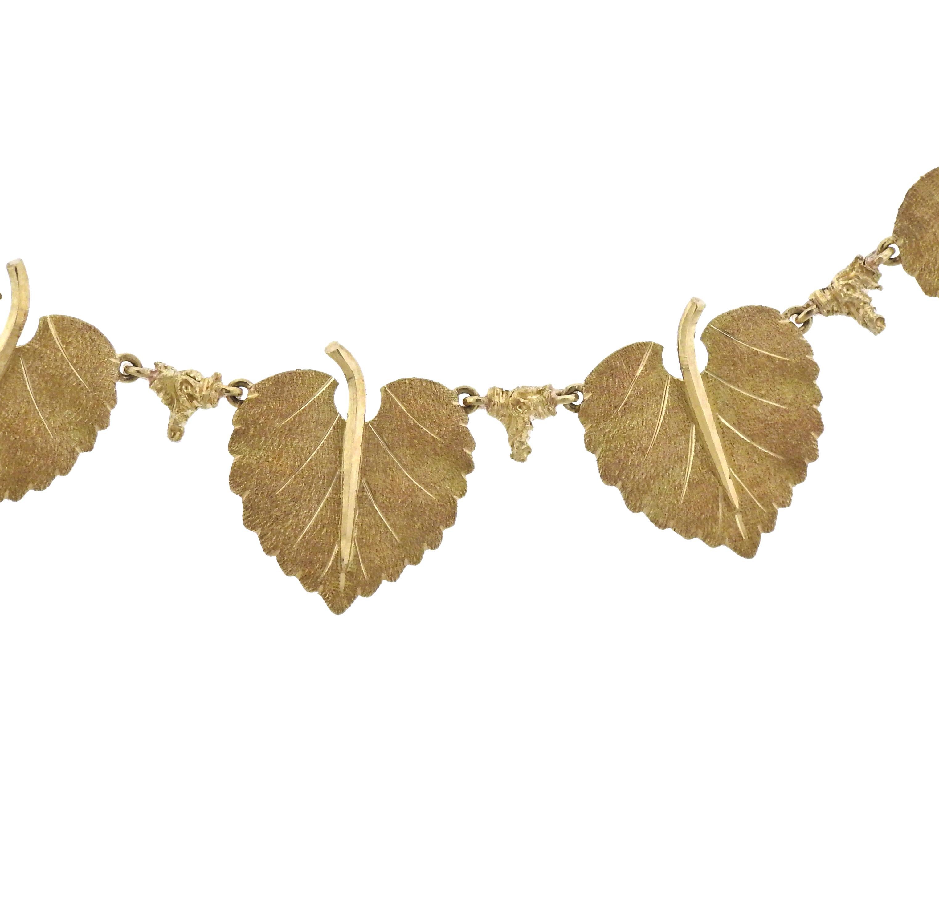 Delicate 18k gold leaf station necklace, by Buccellati.  Necklace is 16