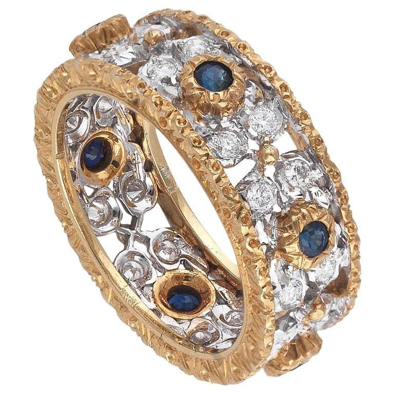 
Band ring with 6 sapphire and diamonds cluster, size 6 1/2 weight 6 gr.