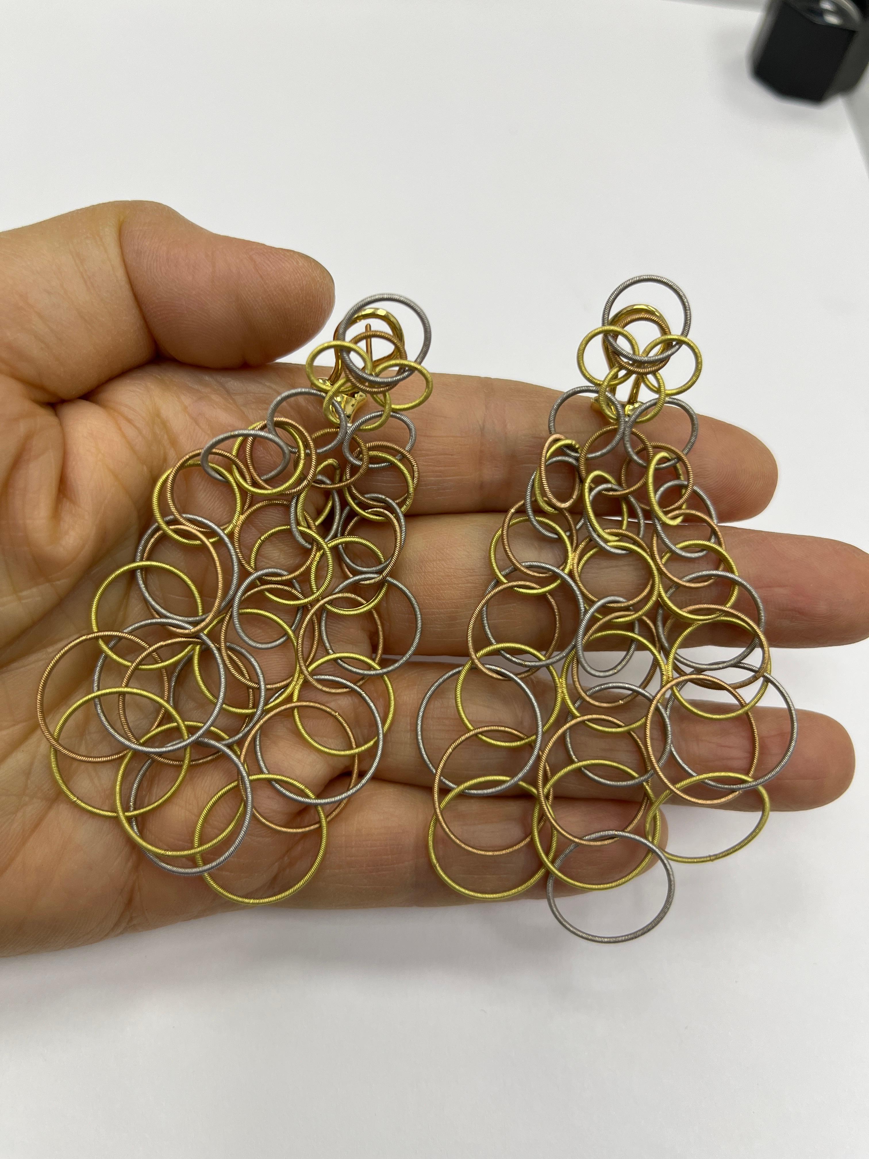 Buccellati Hawaii Pendientes de gota circulares de oro tricolor de 18 quilates 28,1 g Tamaño grande
Marcado : BUCCELLATI 18KT ITALIA 750
3,5